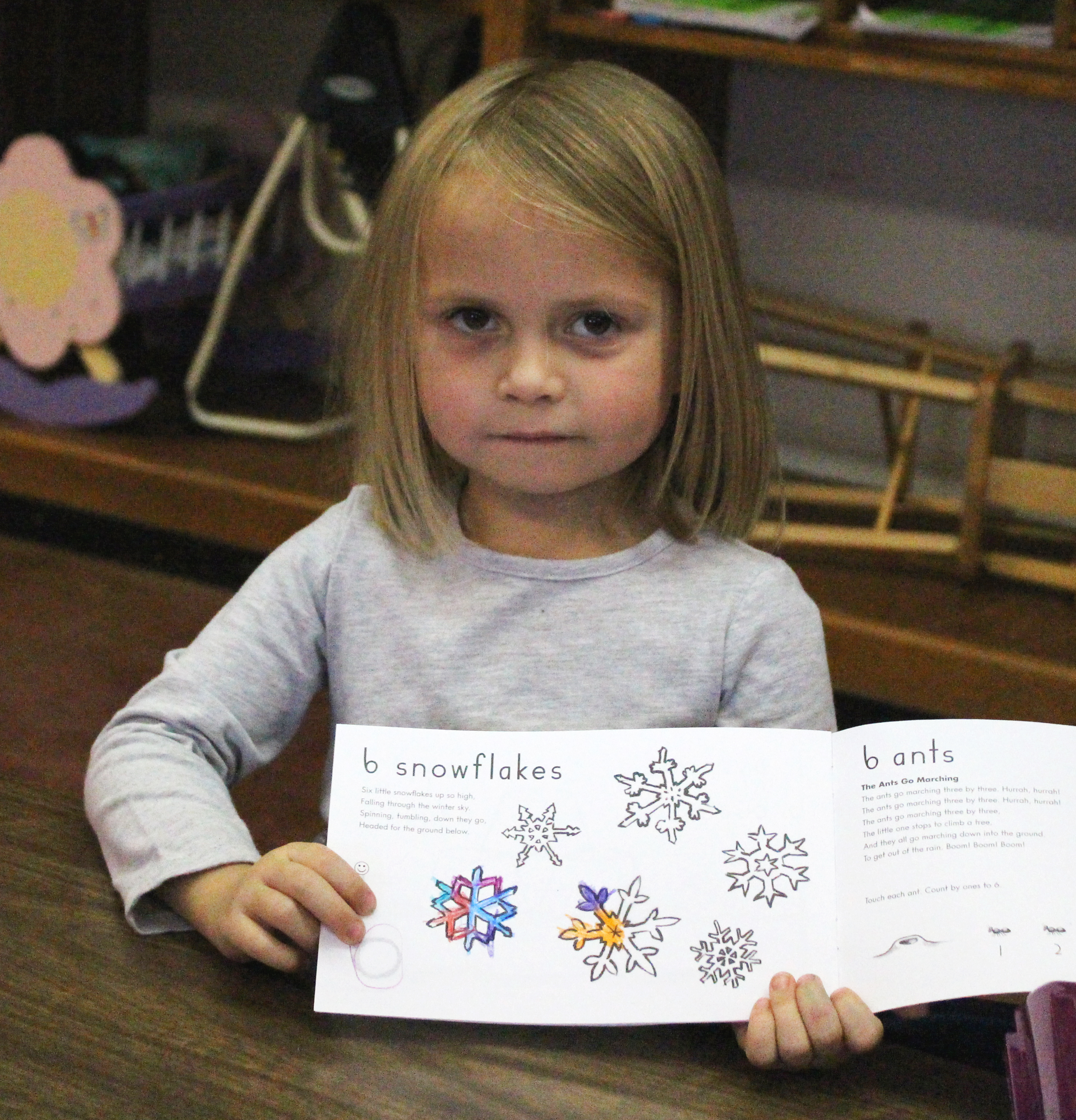 A photo of a 4k program student showing her activity.