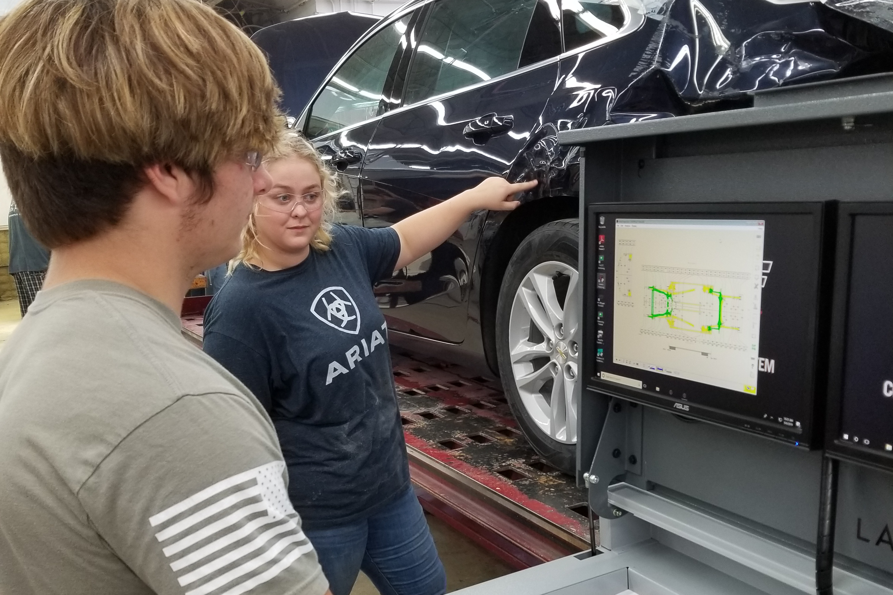 Collision Technology students fix body problems on a vehicle