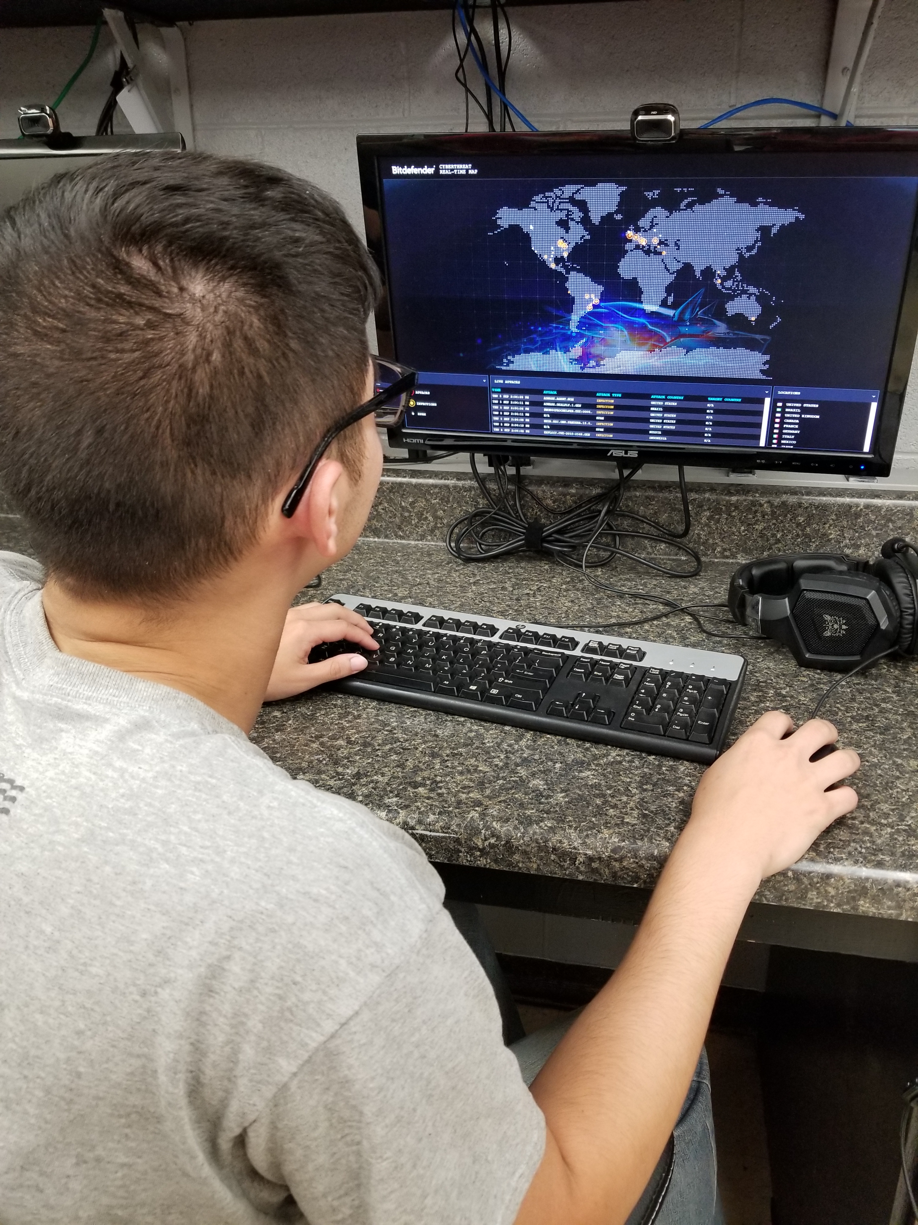 student works on developing skills in computer programming