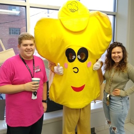 students pose with Toasty the slice of bread