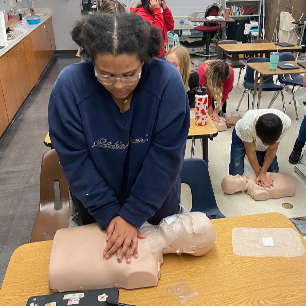 Health Services student practicing CPR