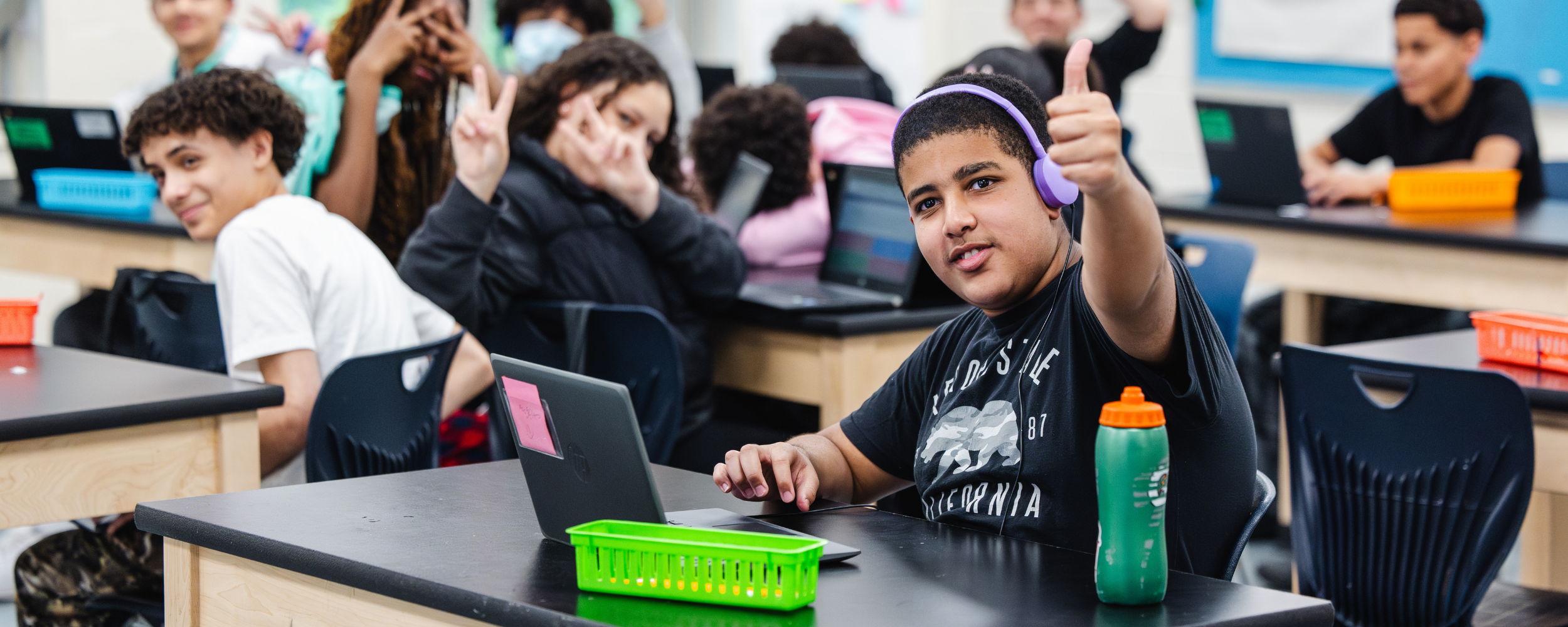 A student gives a thumbs up