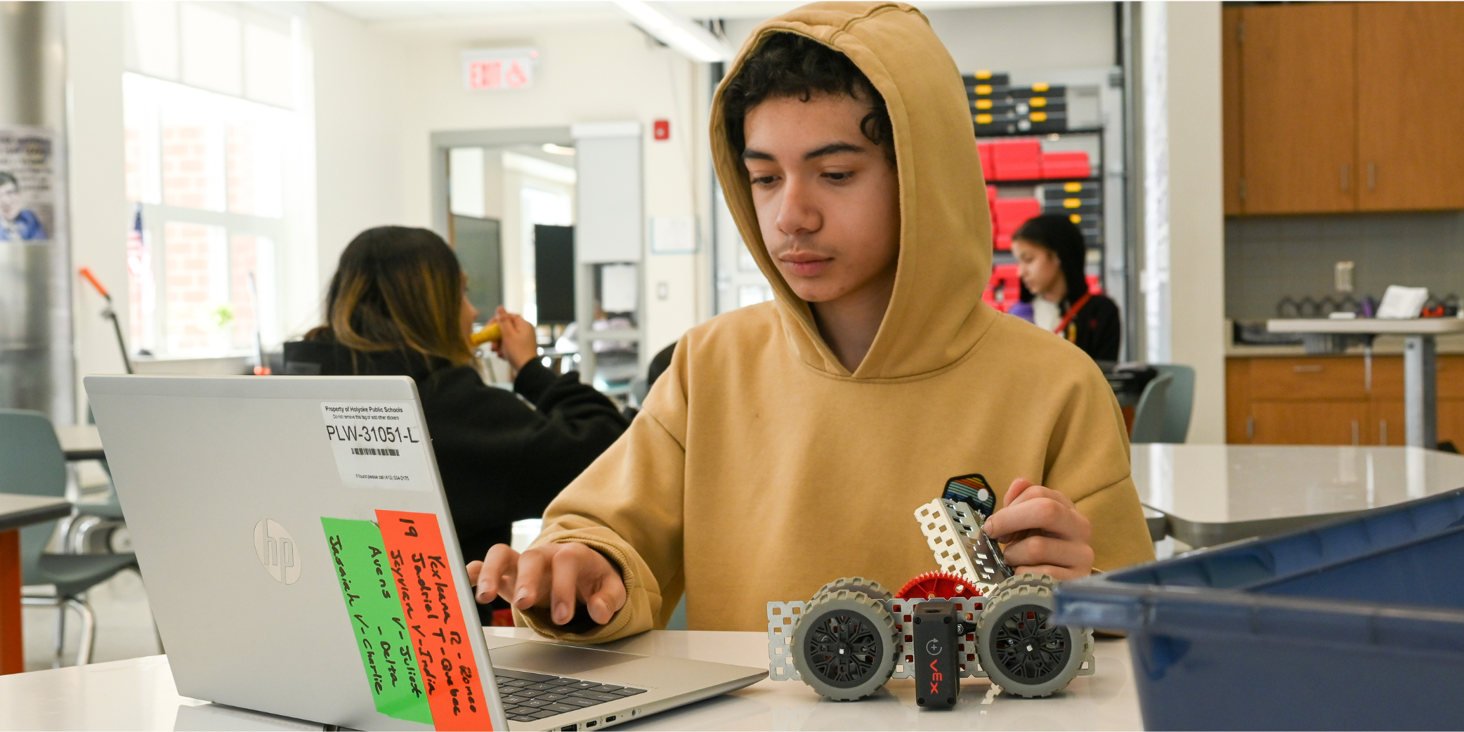 student working on a project in class