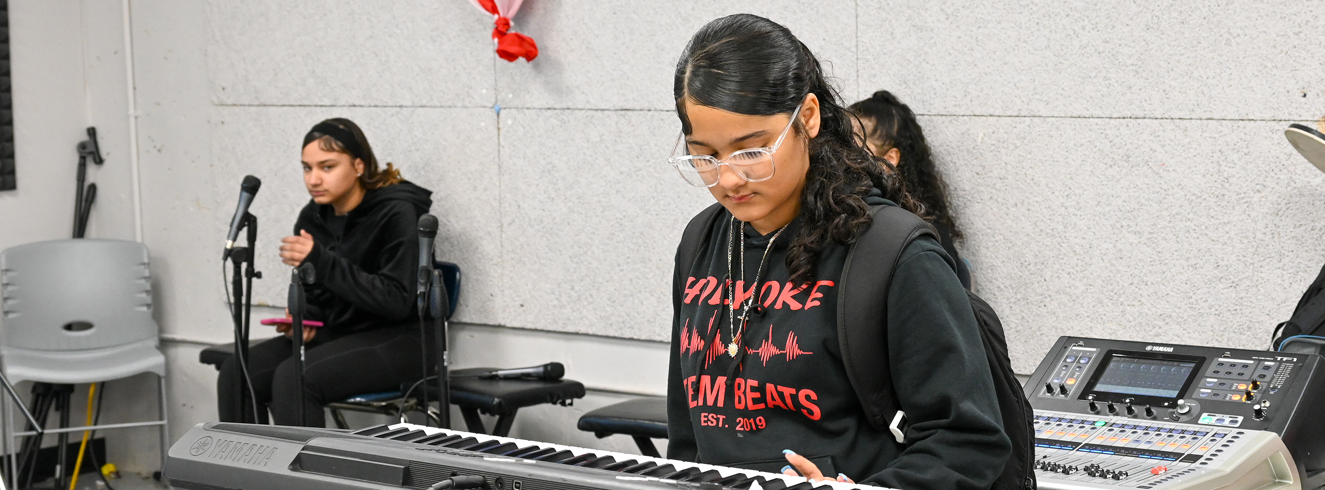 Student plays the piano