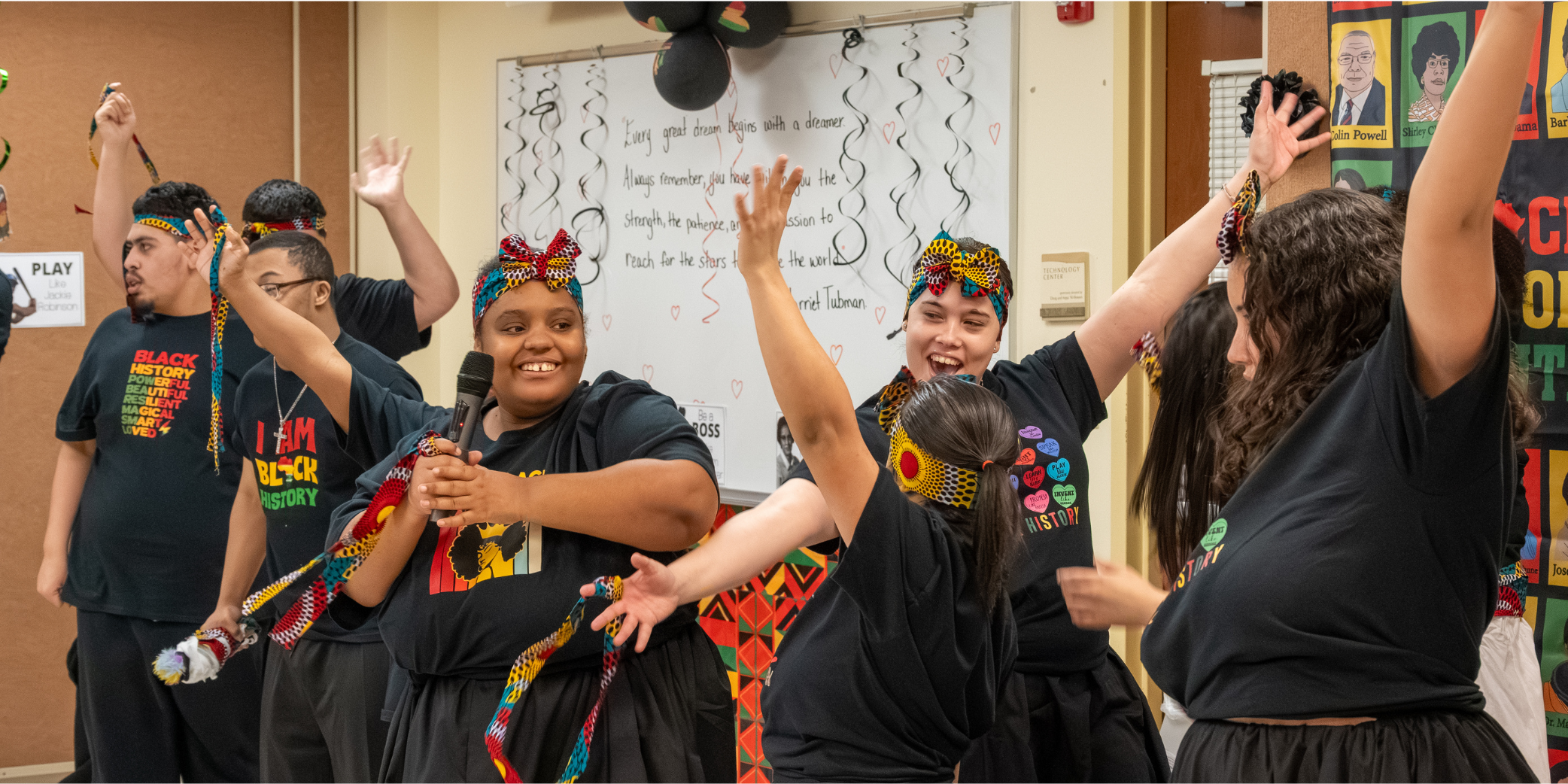 group of students dancing in class