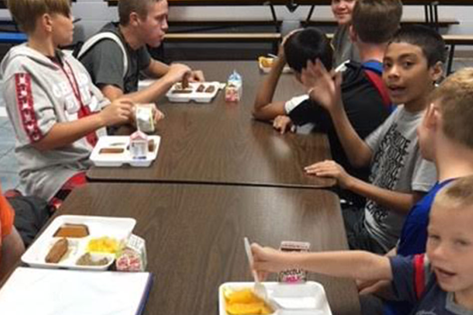 children eating at lunch table
