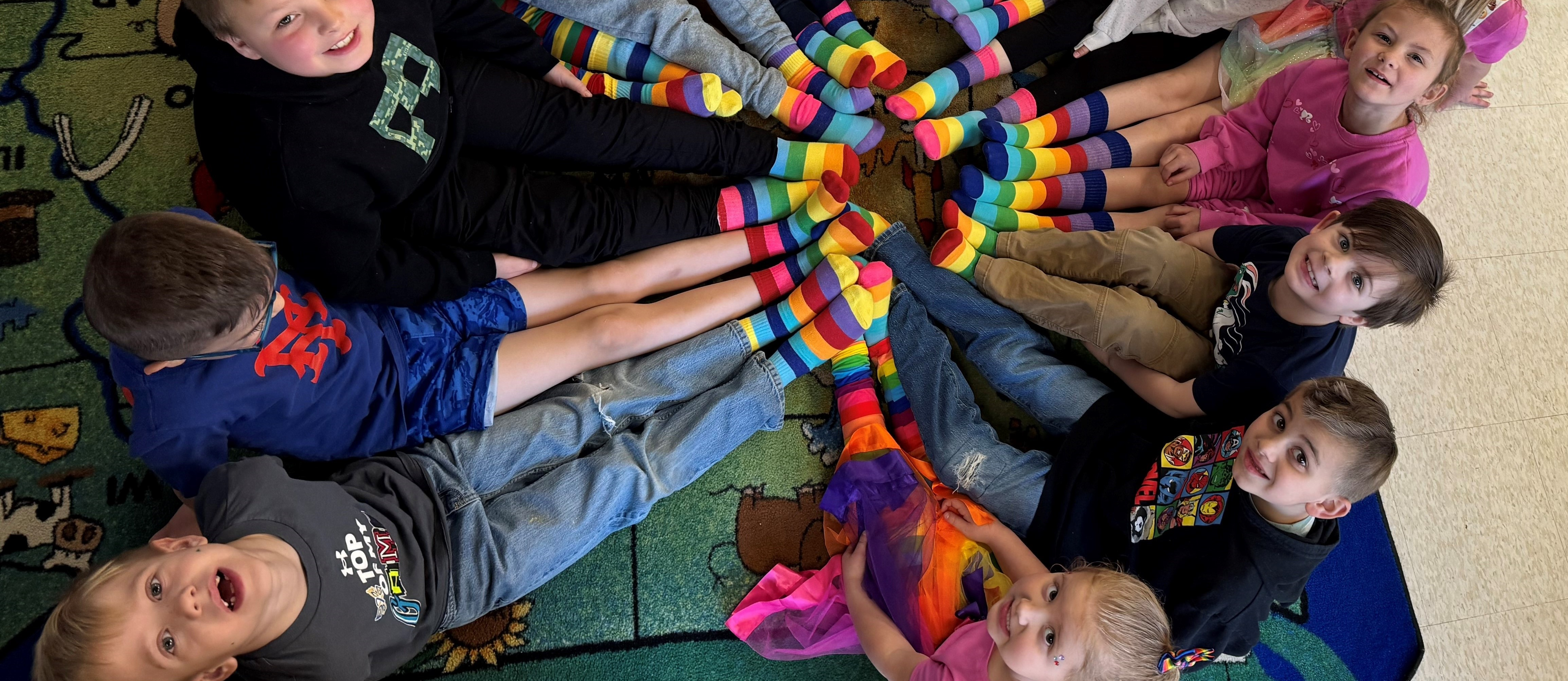 students wearing rainbow socks