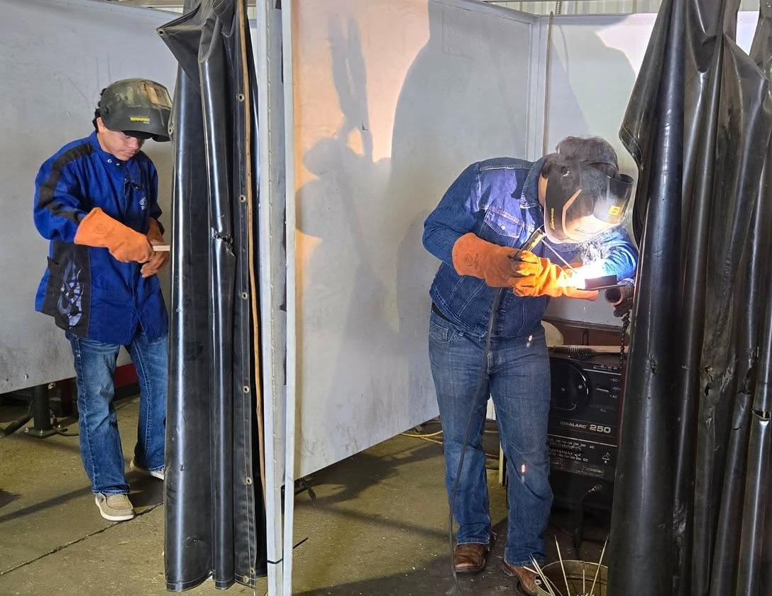 Students practice welding