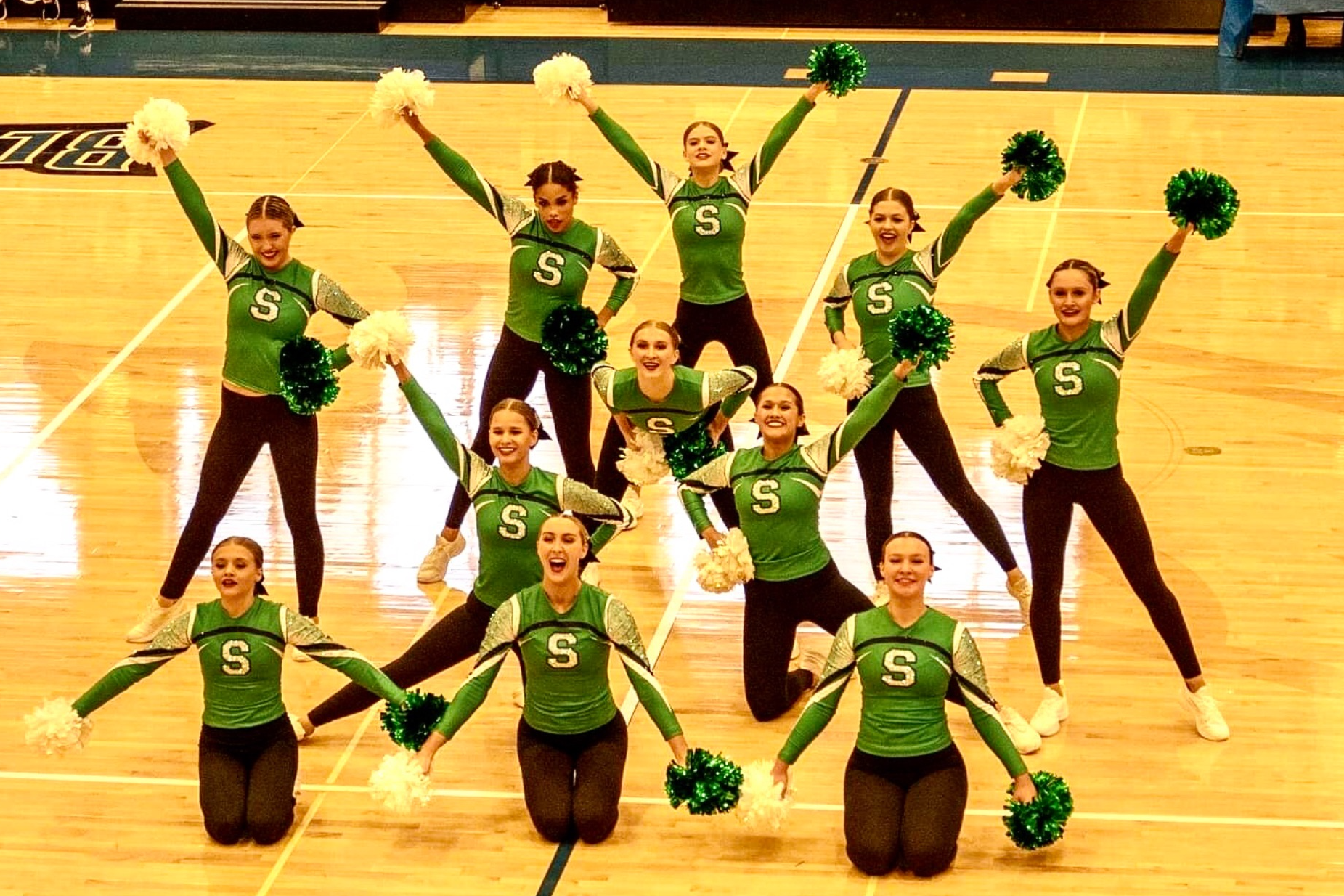Dazzlers pose at end of performance