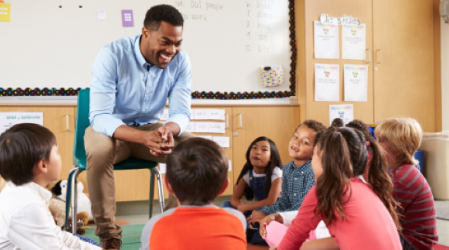 Teacher and students, stock image