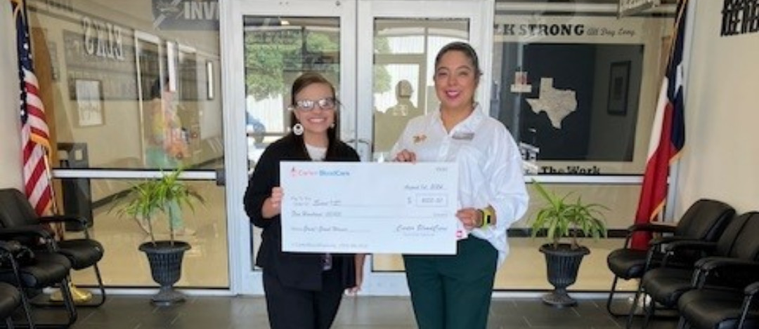 Carter Blood Care image with representative and JBuck; Counselor receiving check 