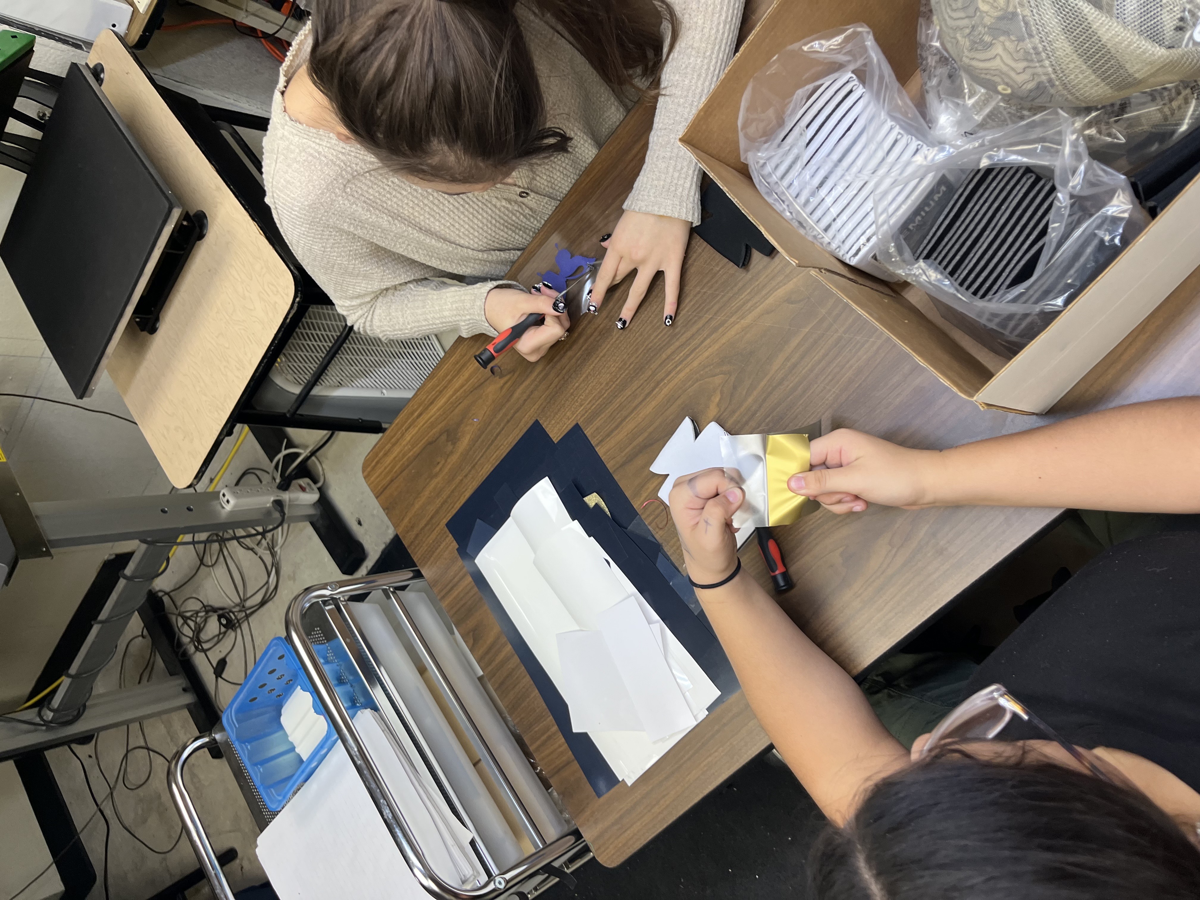 Students prepare their creations , image