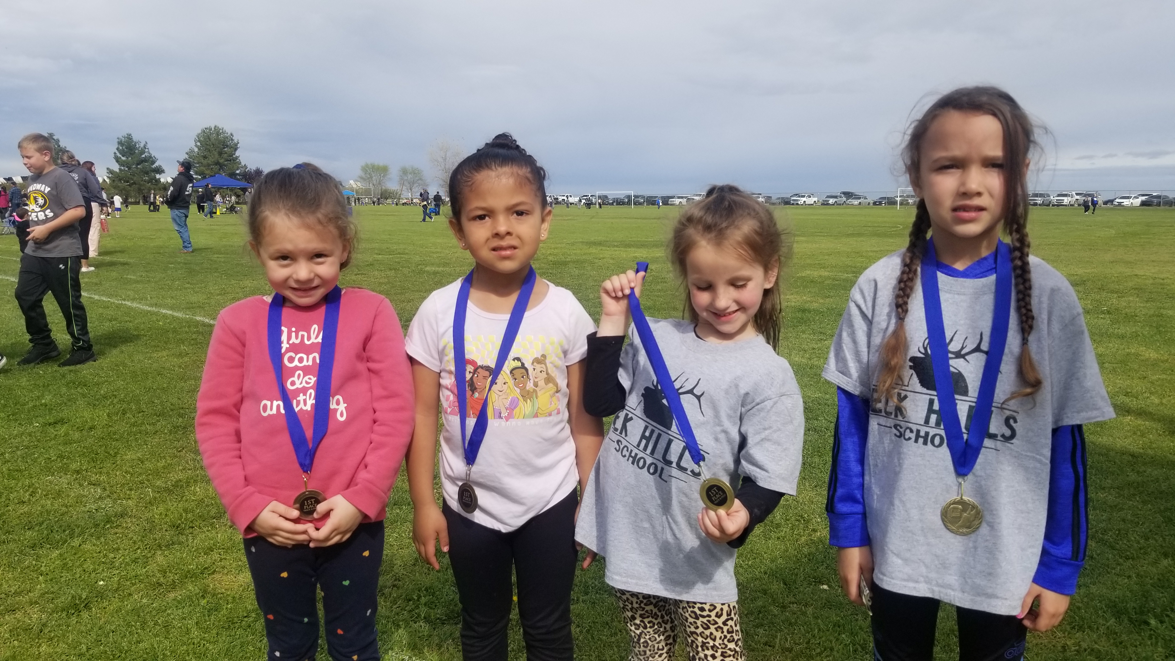 kinder girls show off medals