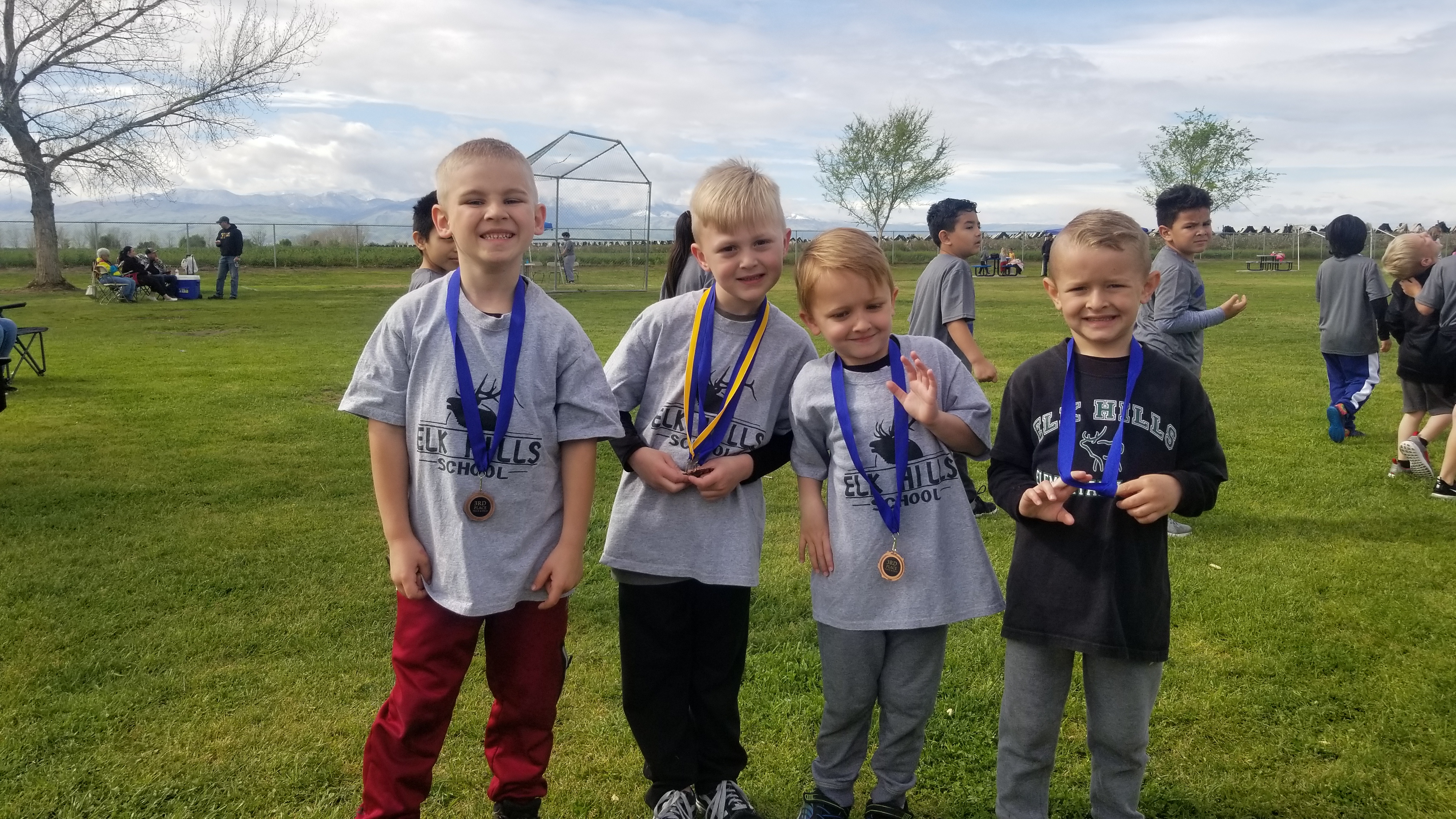 Kinder boys show off medals
