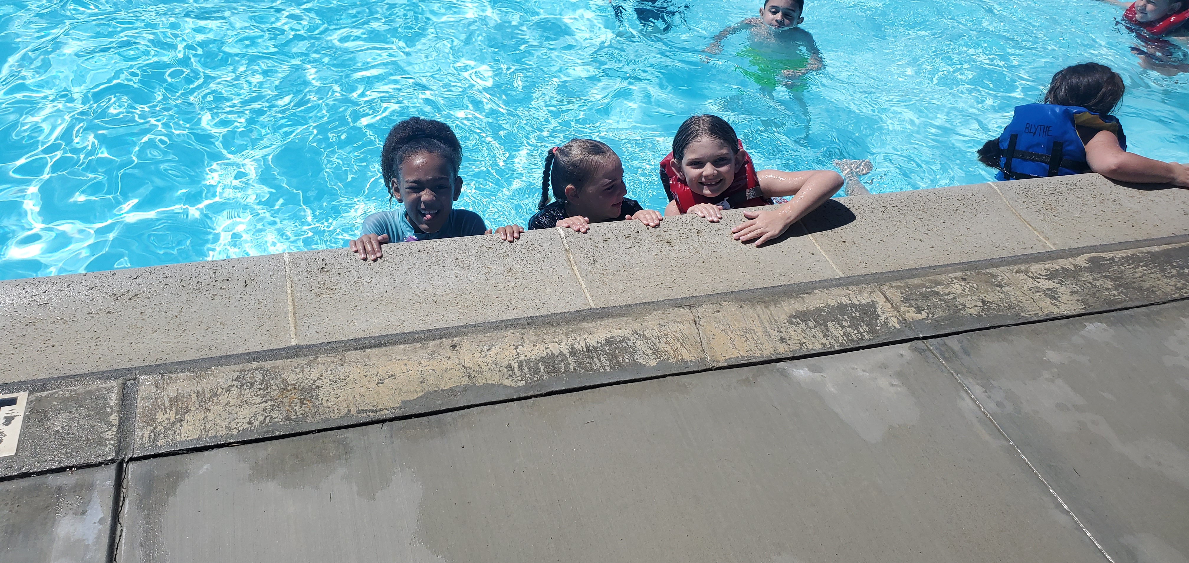 Three students in pool