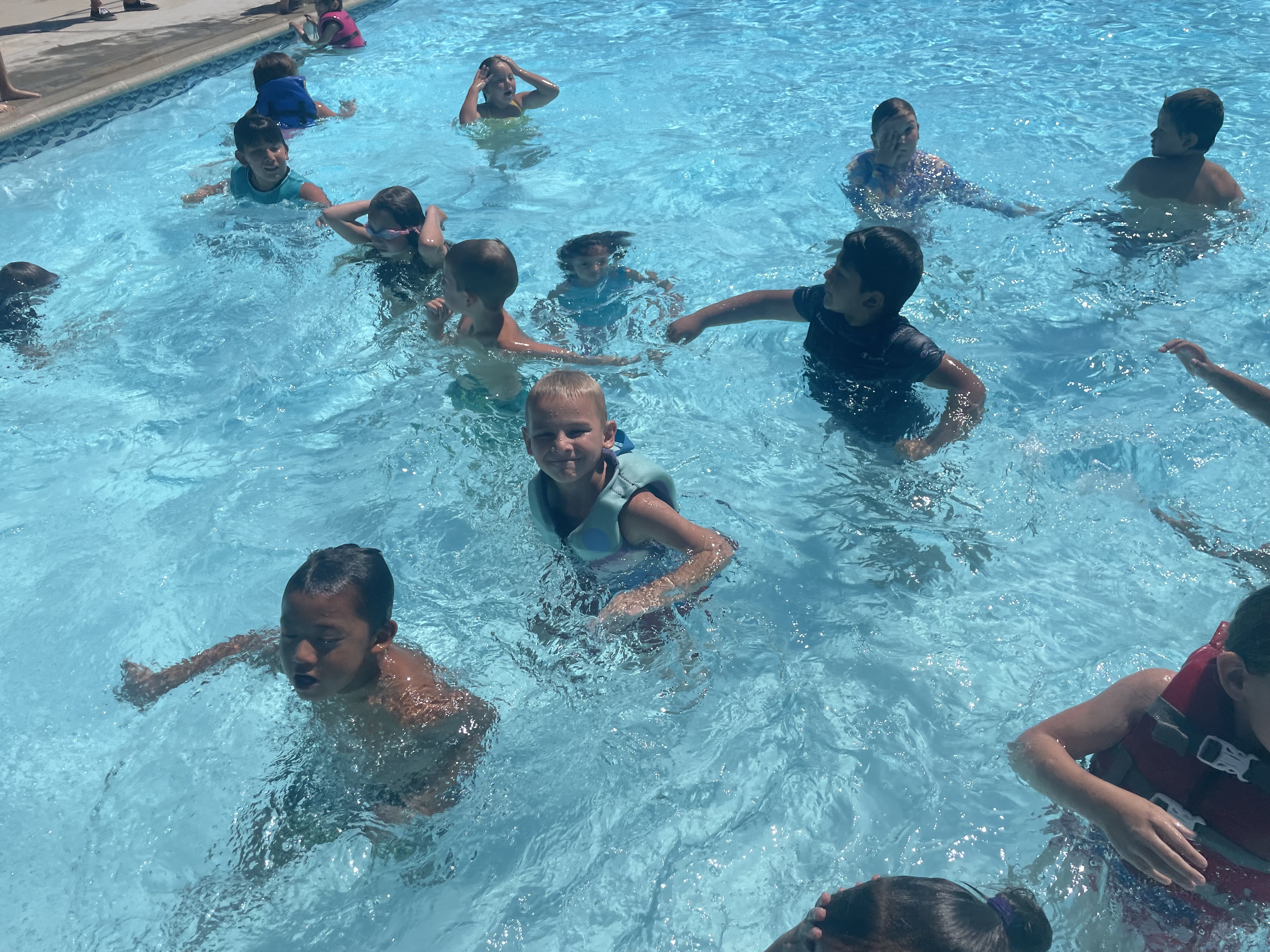students in pool