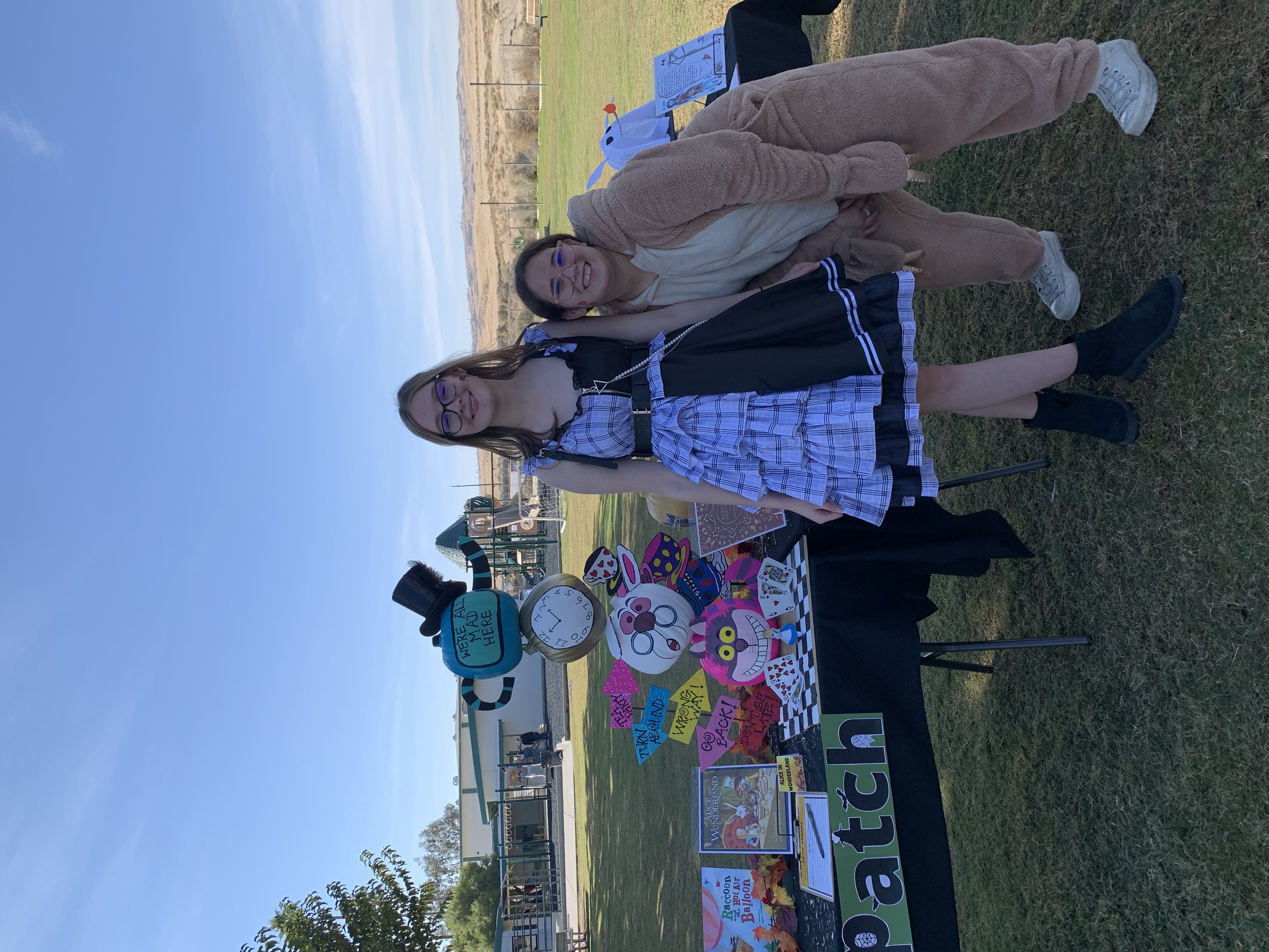 Students in front of pumpkin table