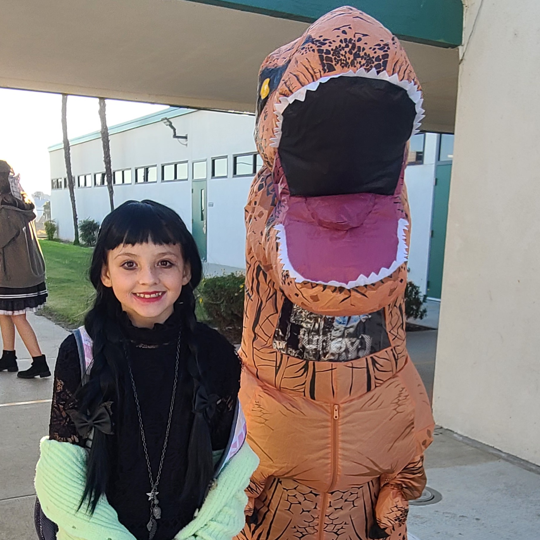Students in dino costume