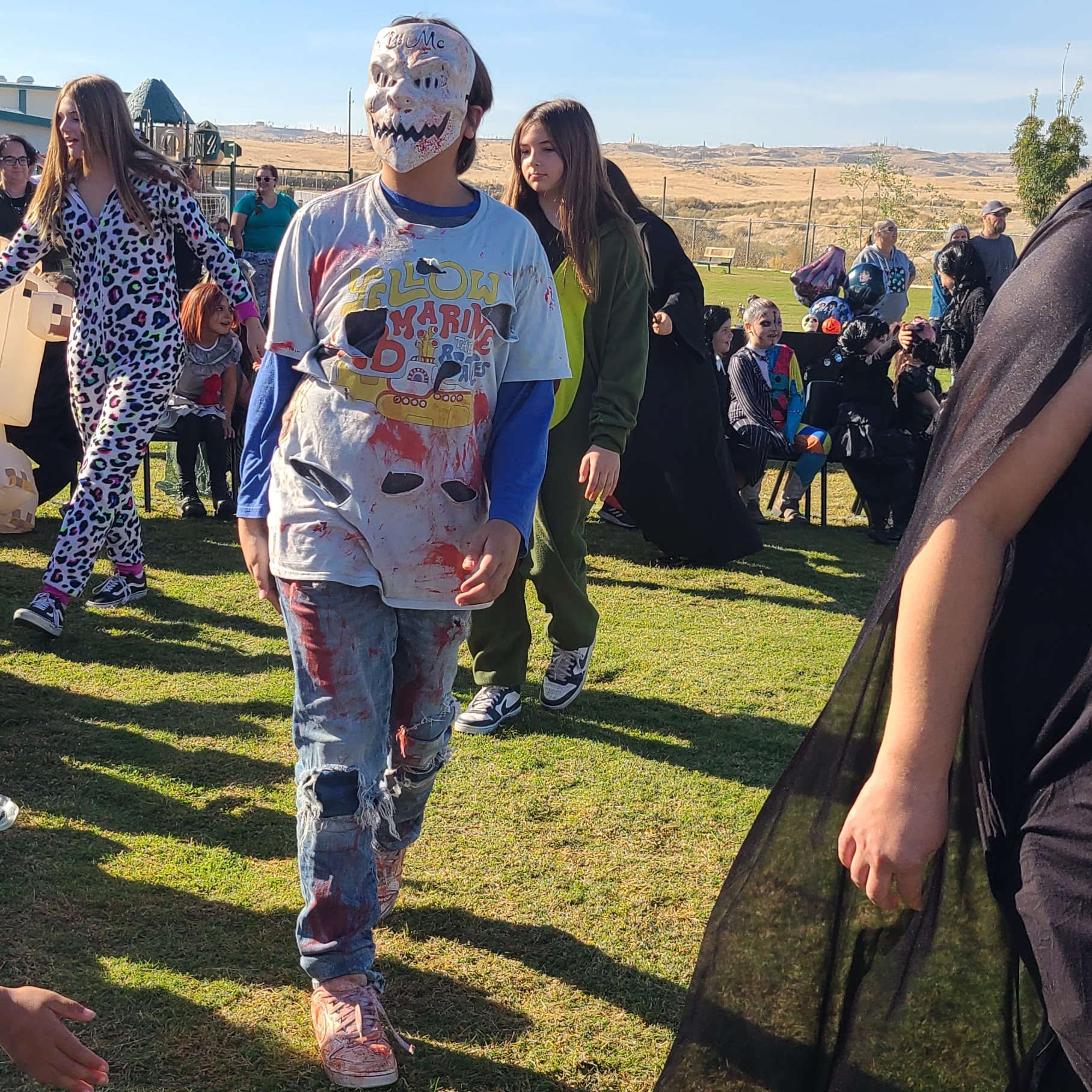 Student in creepy clown costume