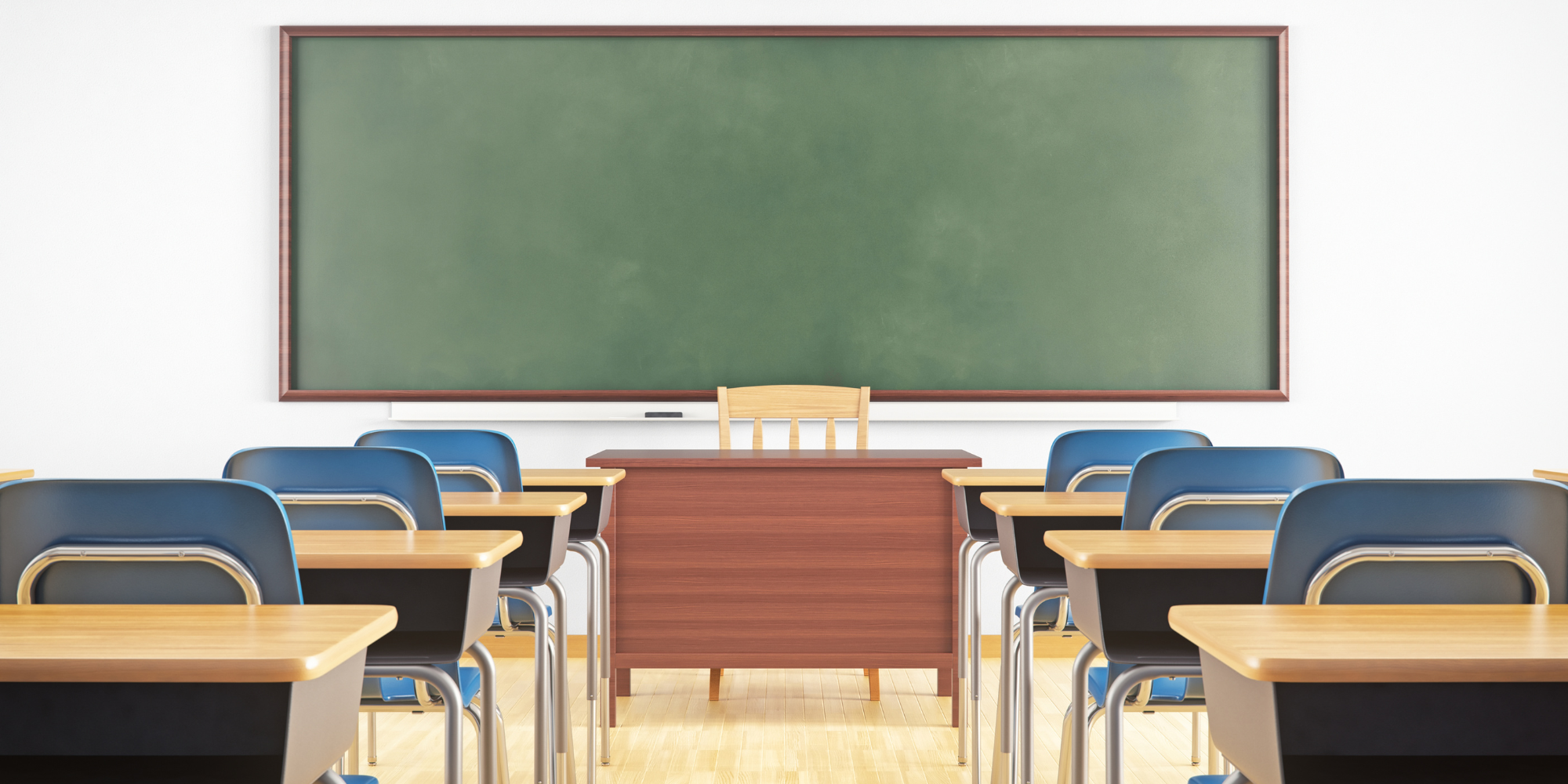empty classroom with desks and blackboard