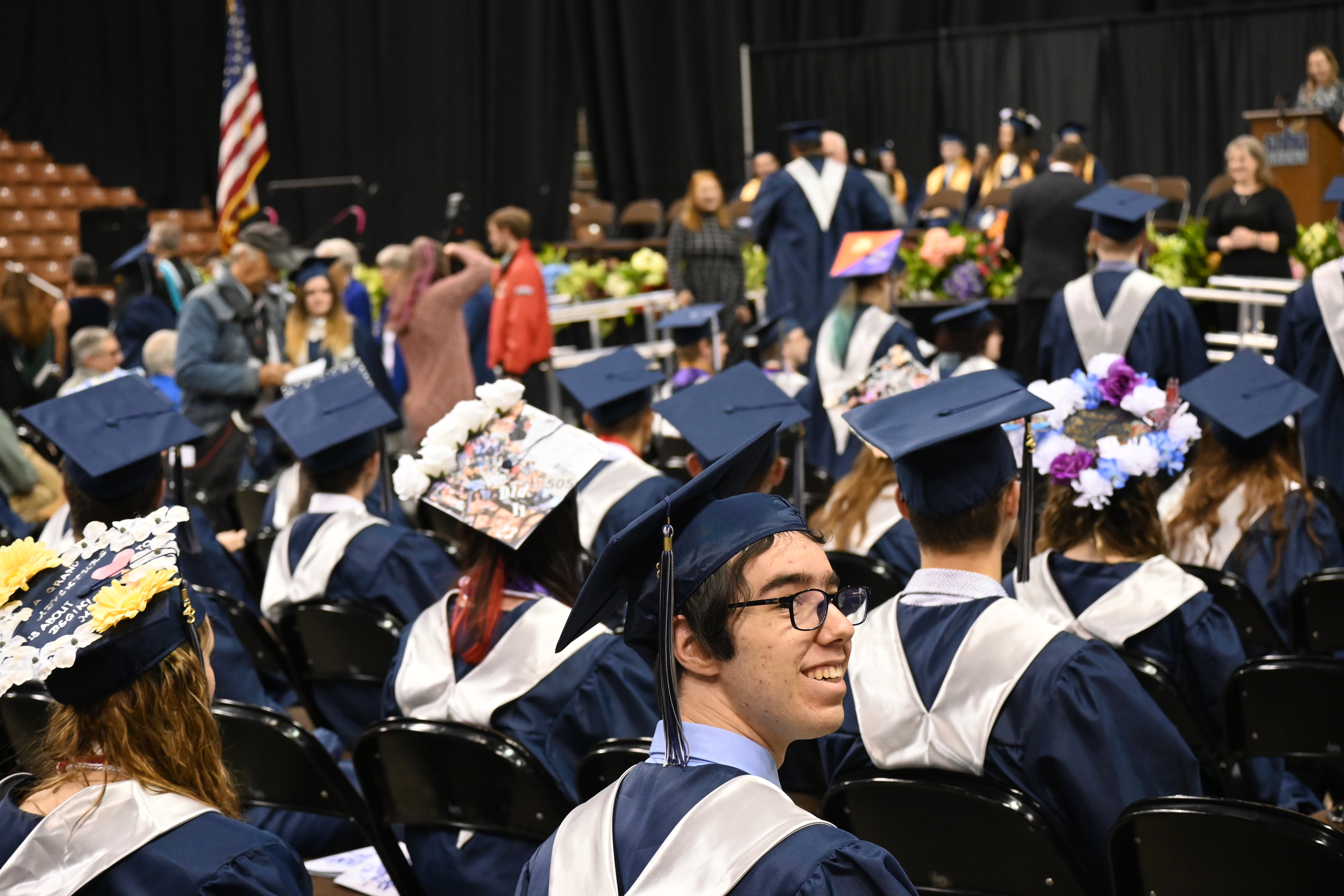 MST graduate smiles at family member at 2023 graduation