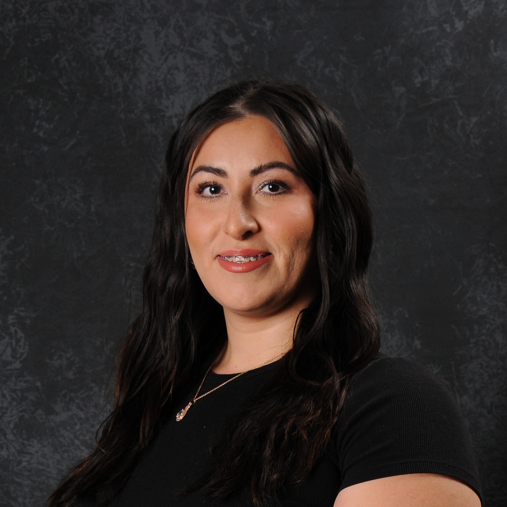 Dulce Suell, is the district employee of the month