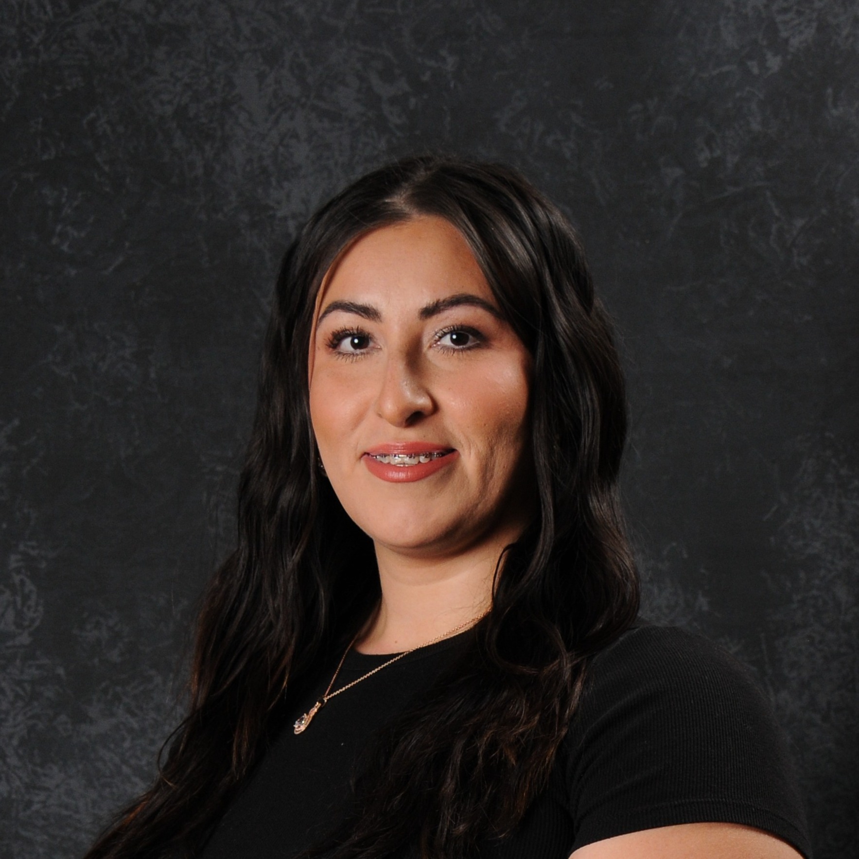 Dulce Suell, is the district employee of the month