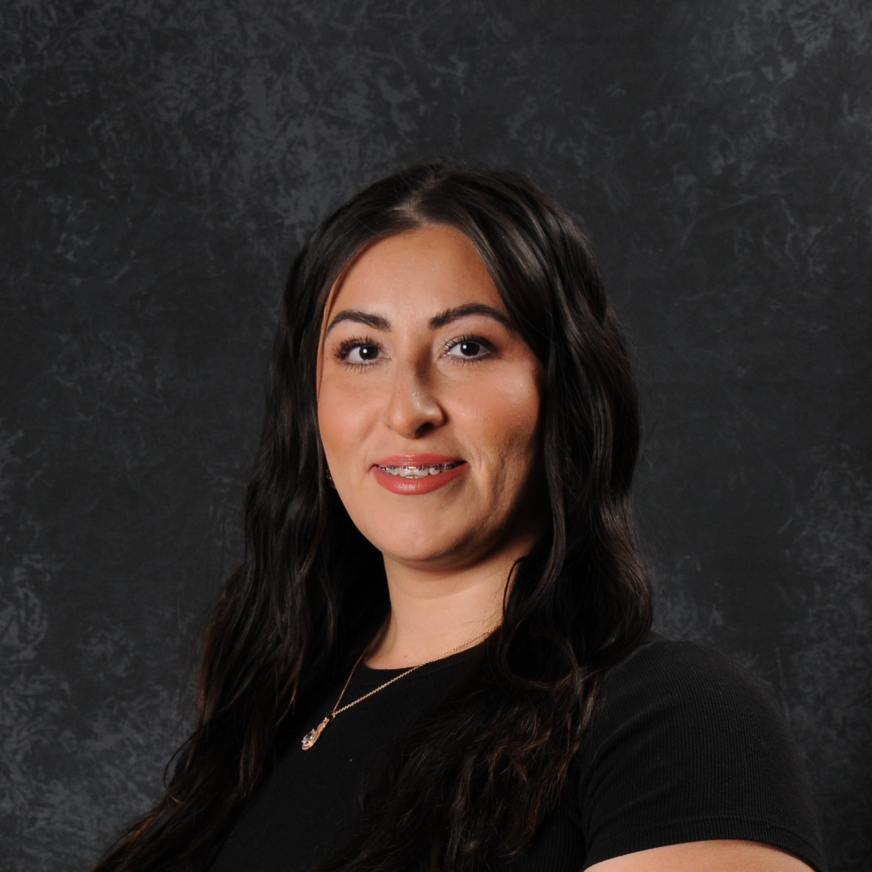 Dulce Suell, is the district employee of the month