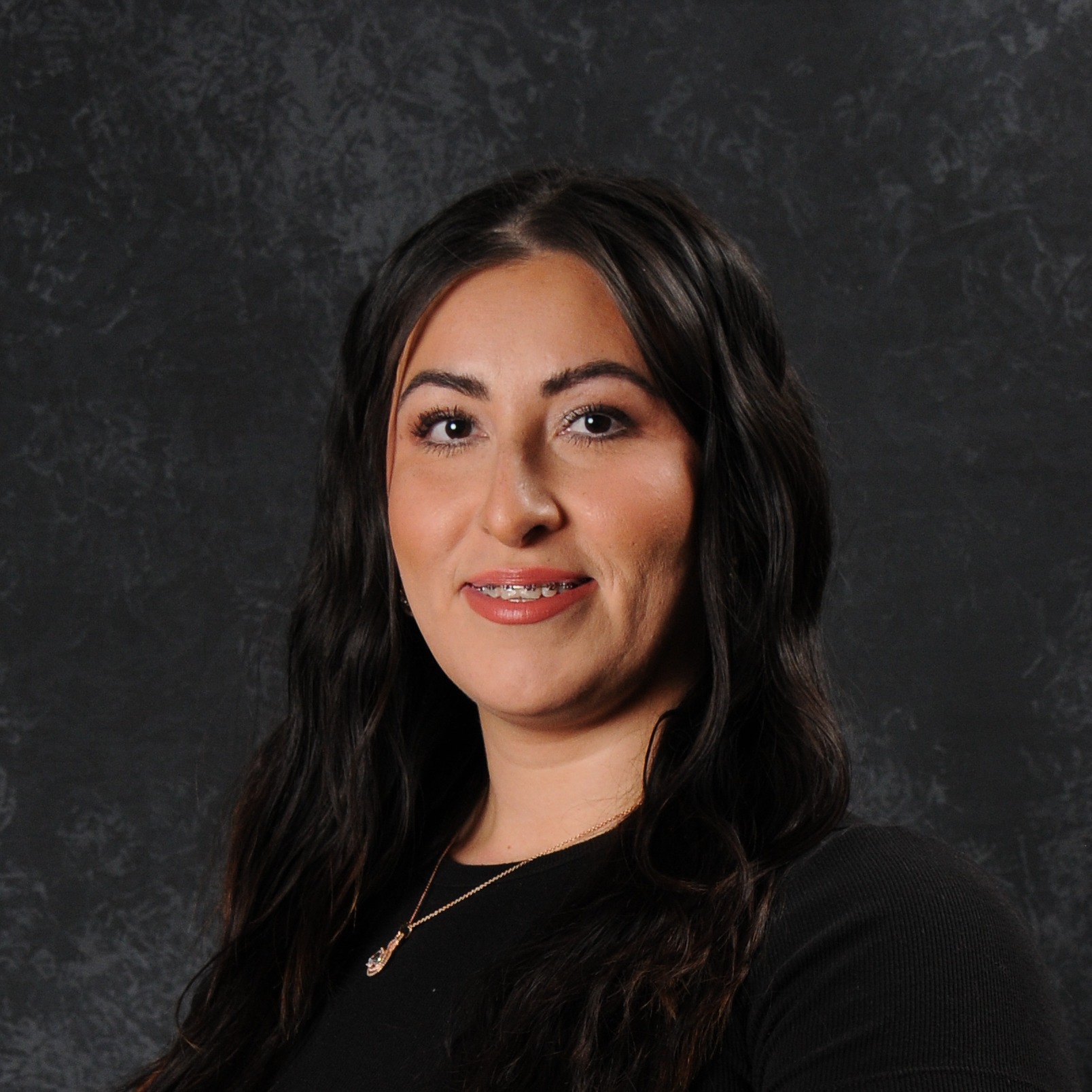 Dulce Suell, is the district employee of the month