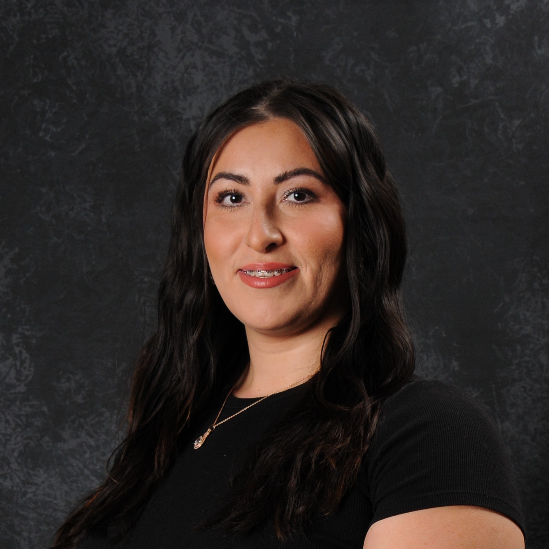 Dulce Suell, is the district employee of the month