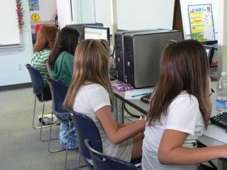 kids using computers in class