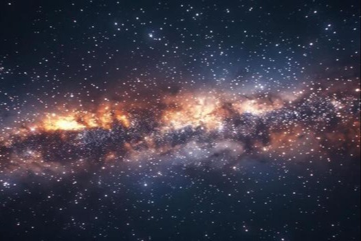 Dark sky filled with stars and a glowing Milky Way galaxy stretching across the center.