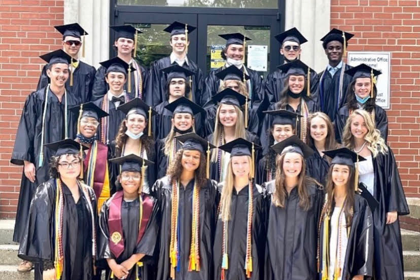 students in graduation cap and  gown