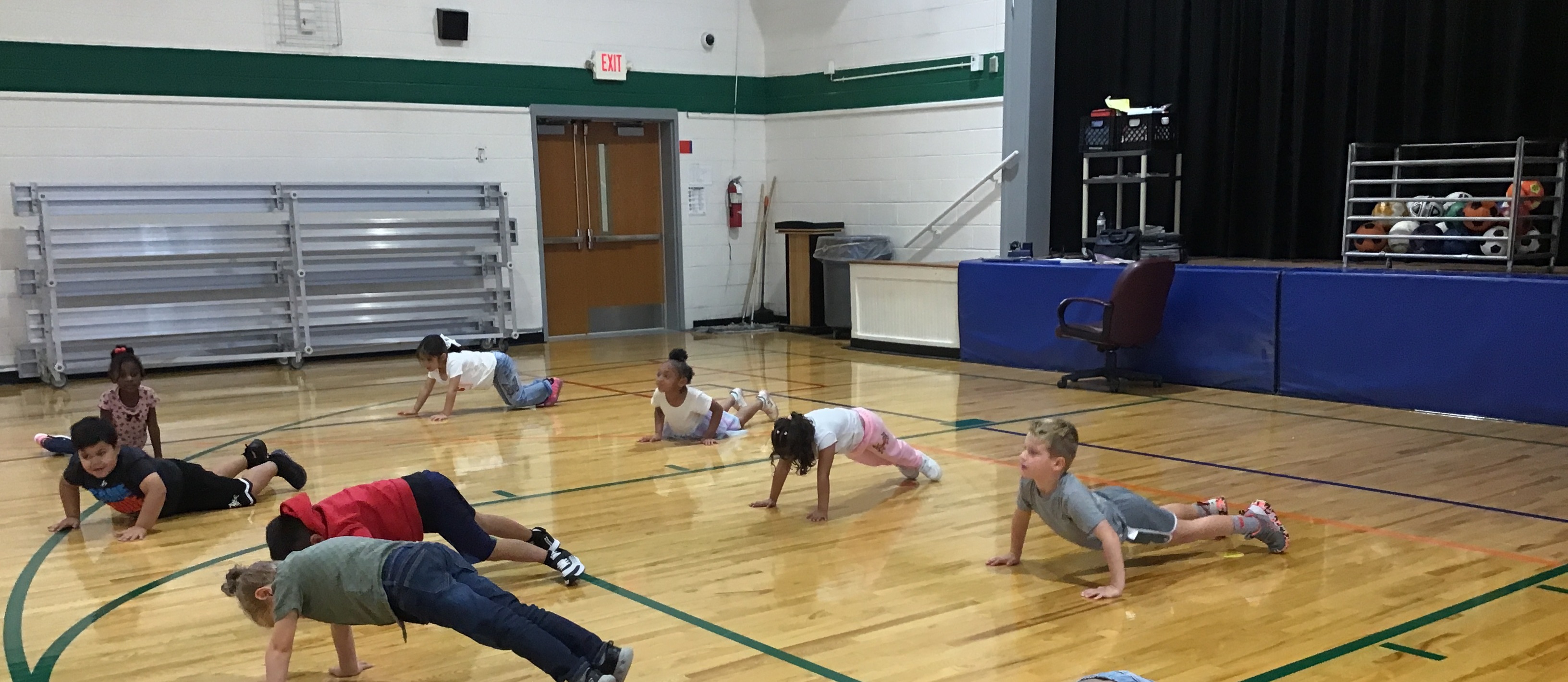 Kindergarten doing pushups
