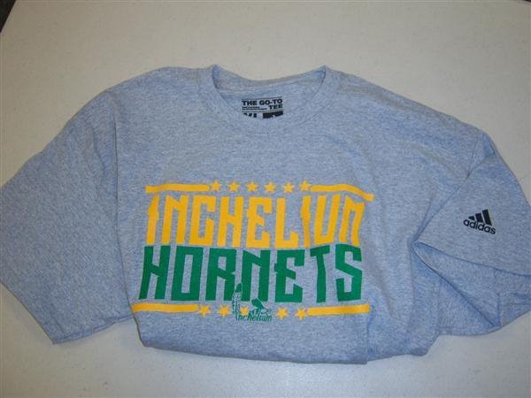 Grey t-shirt with yellow inchelium and green Hornets