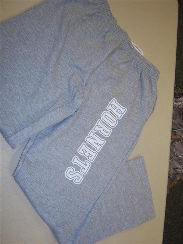 Grey sweatpants with white letters Hornets on left leg
