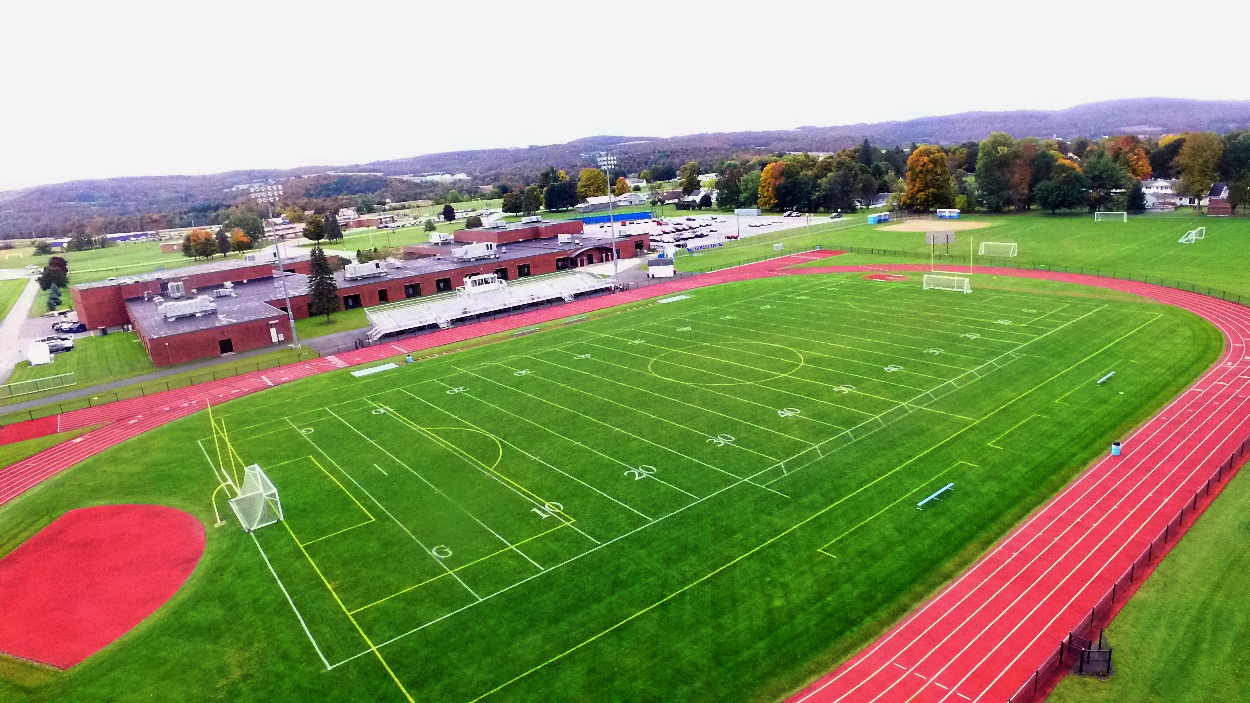 Aerial photo of football field and high school