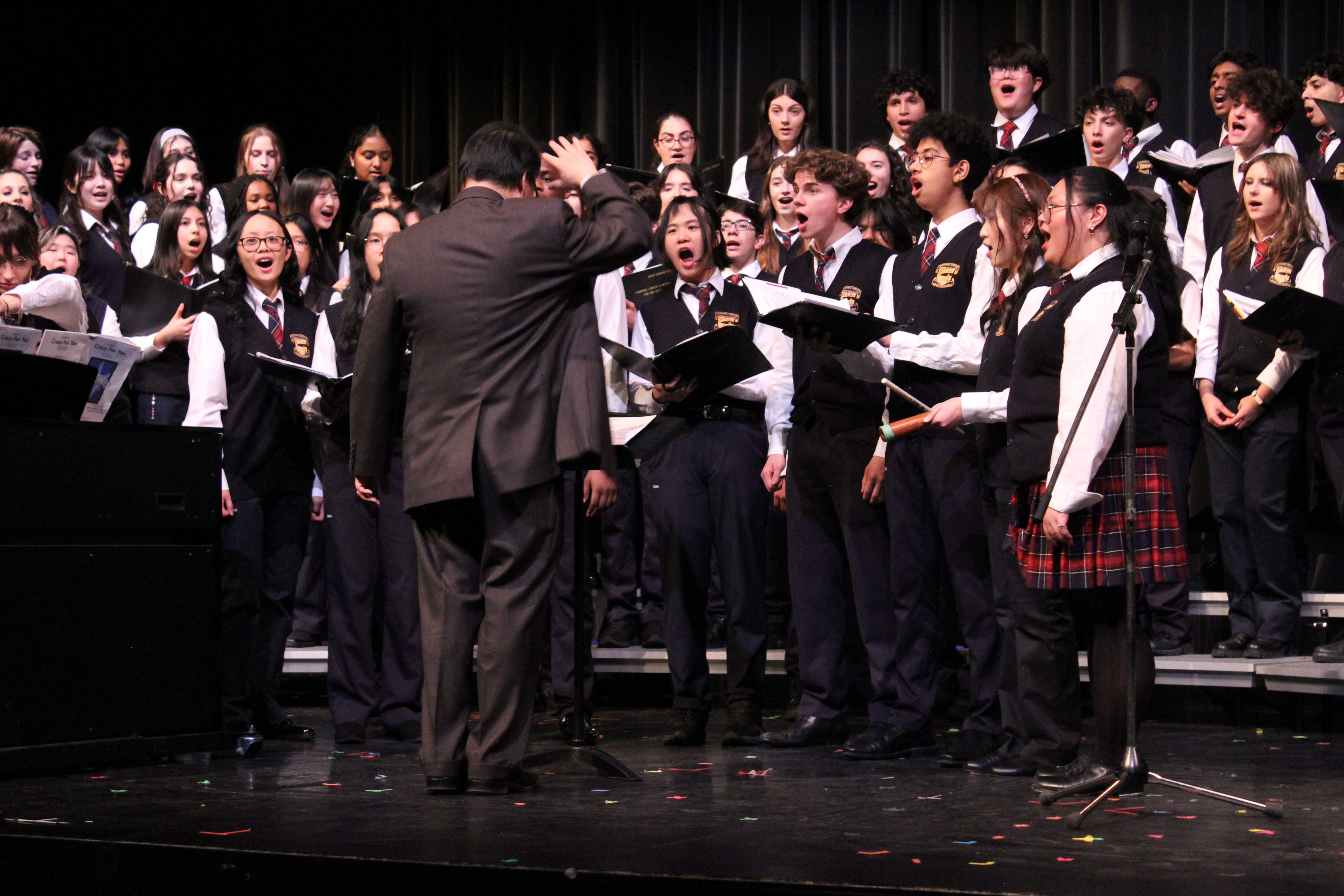 A choir on stage.