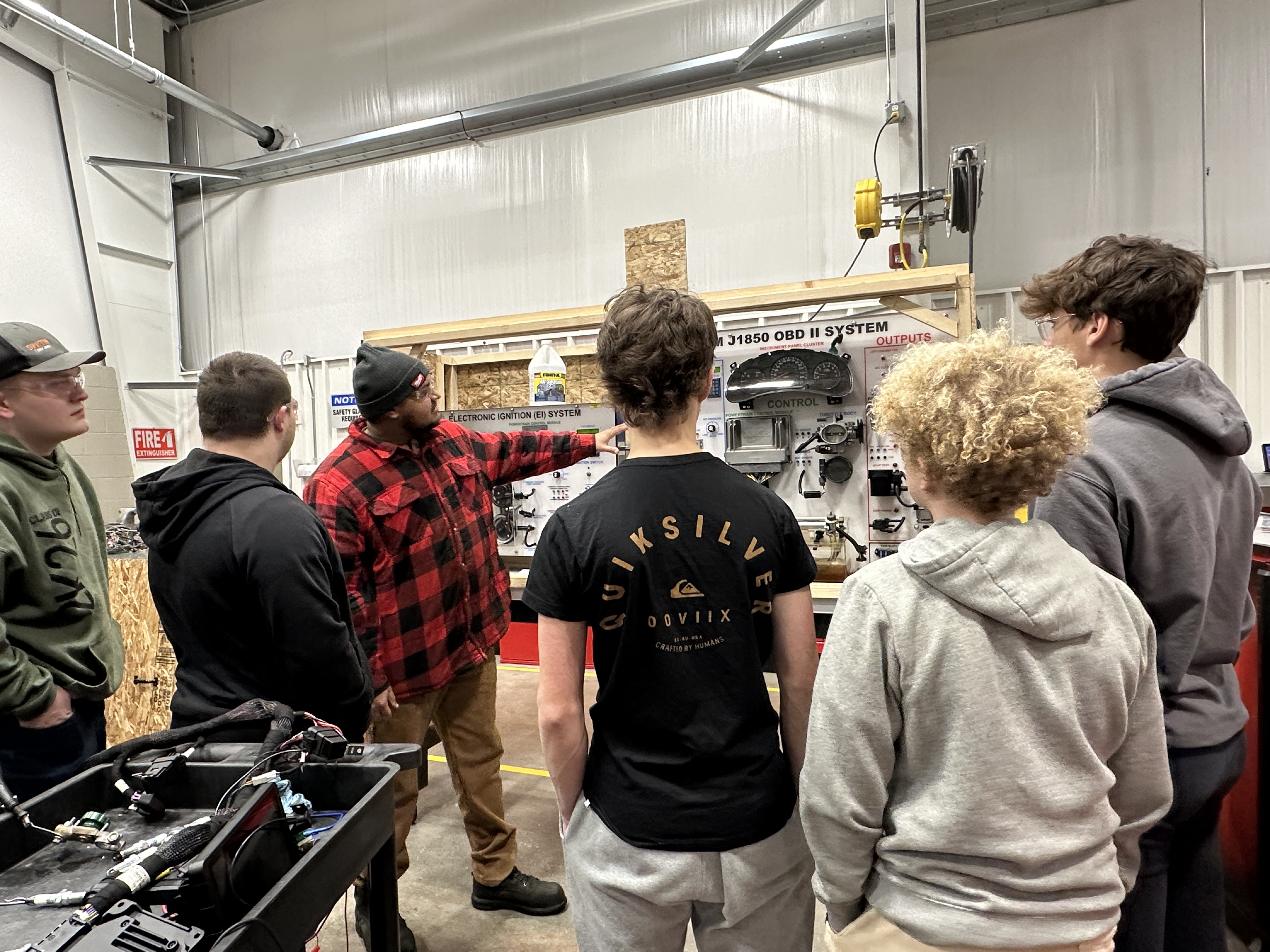 Auto Instructor showing Electrical Panel to students