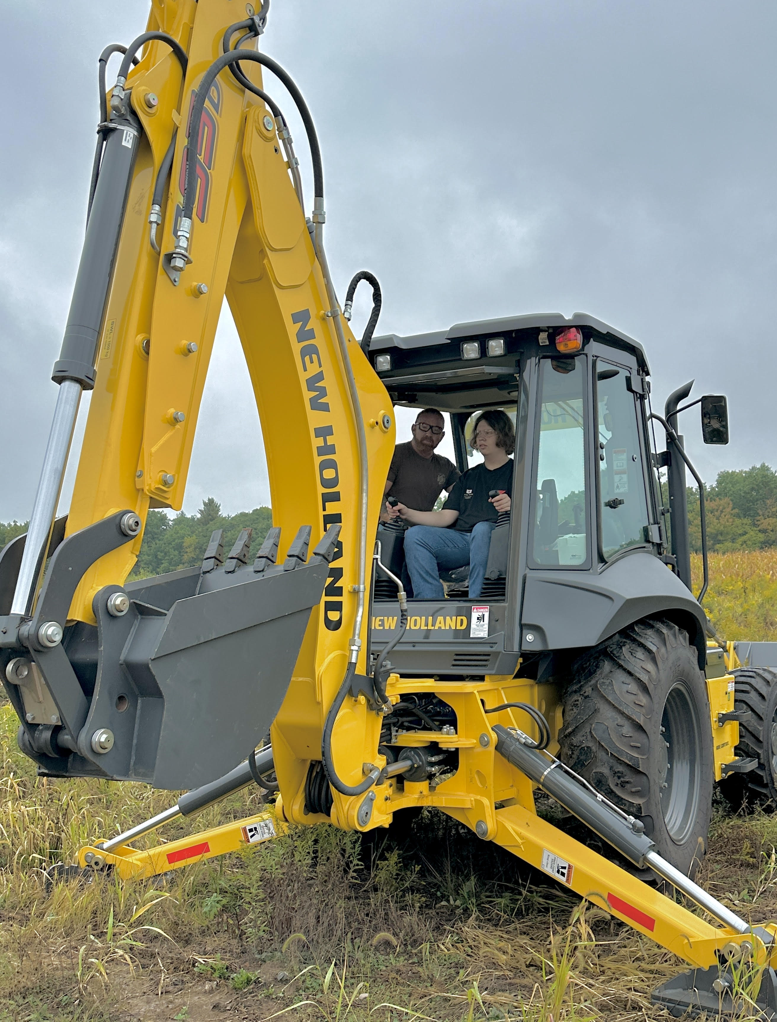 Diesel Student on Back Hoe