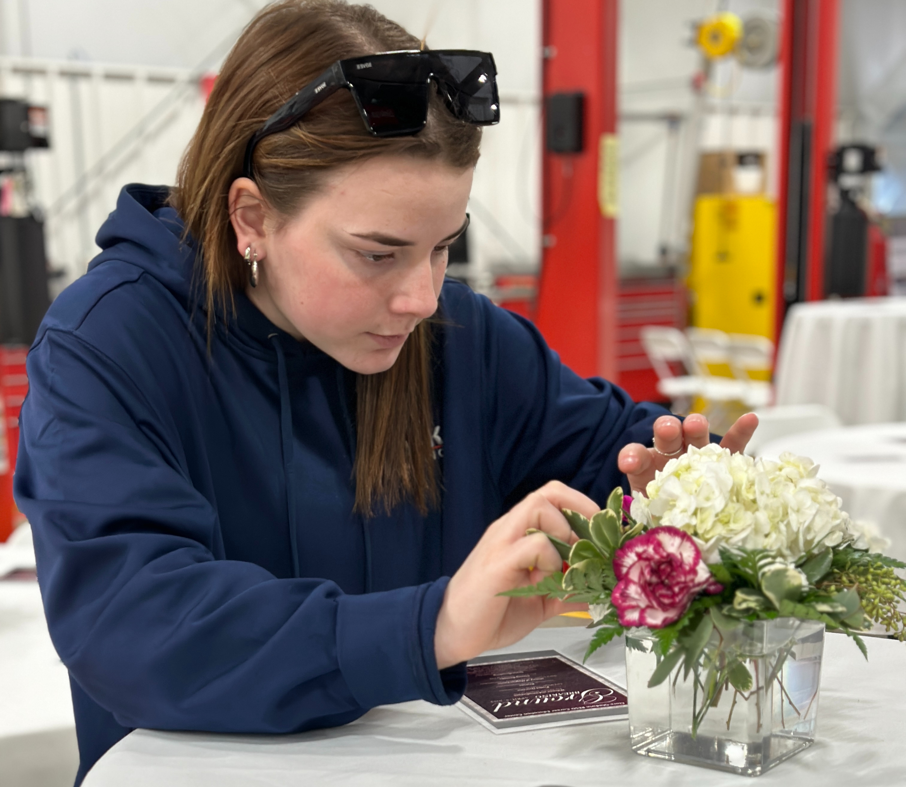 Ag Science Student making flower arrangements