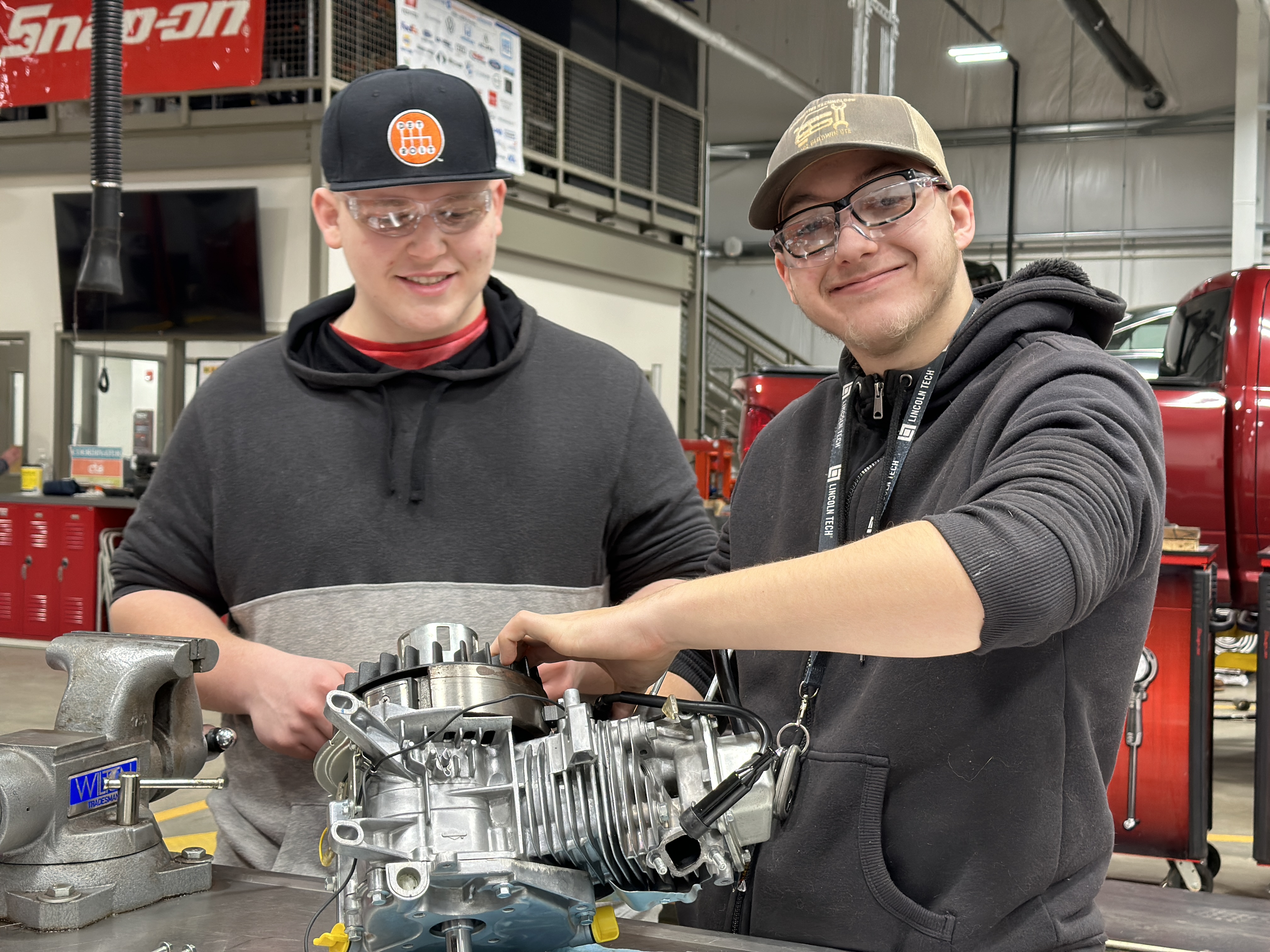Auto Students working on Engine