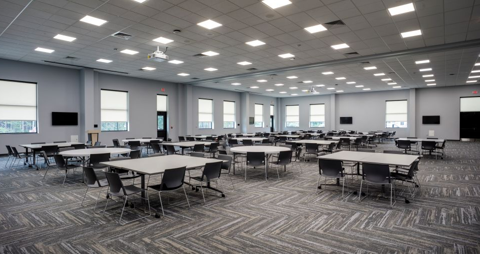 CTE LARGE CONFERENCE ROOM WITH TABLES AND CHAIRS
