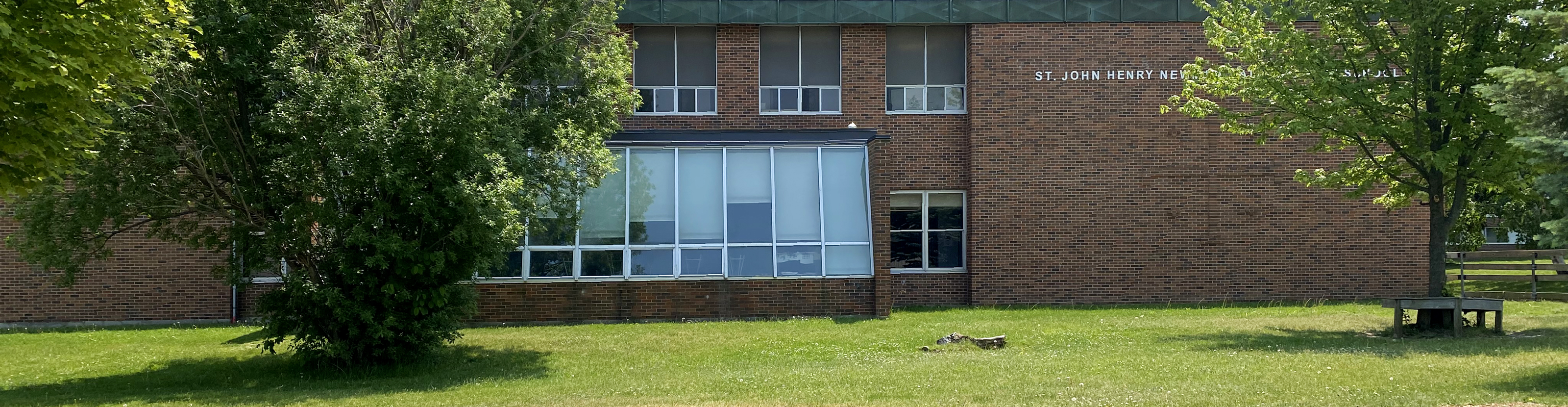 The front of the St. John Henry Newman school building.