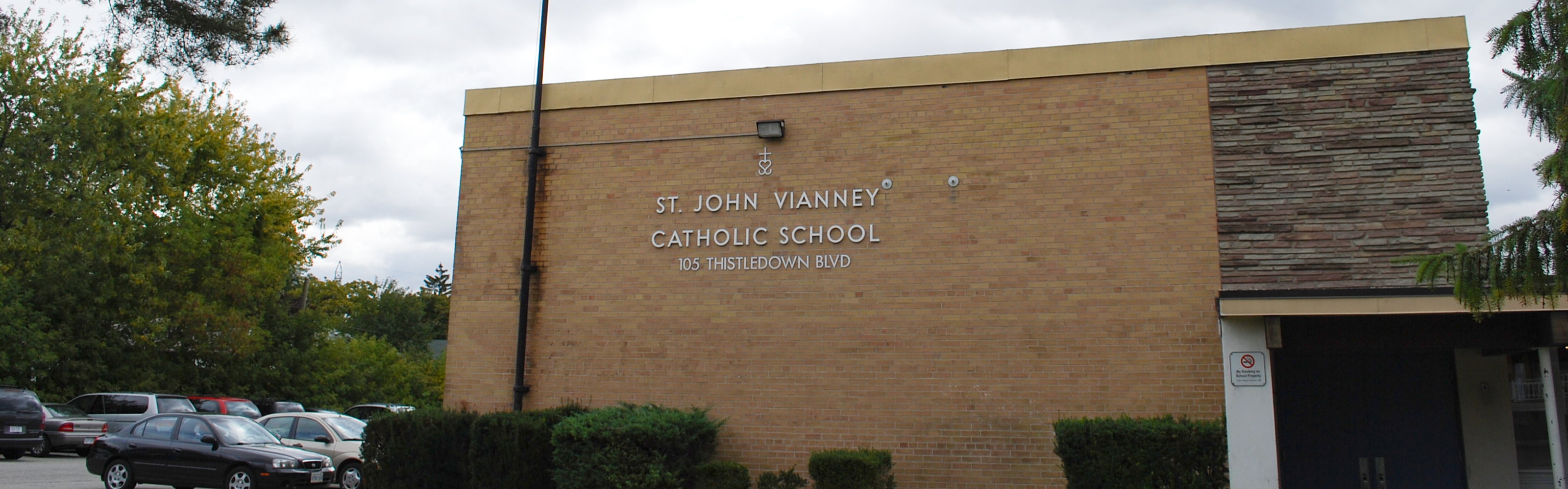 The front of the  St. John Vianney Catholic School building.