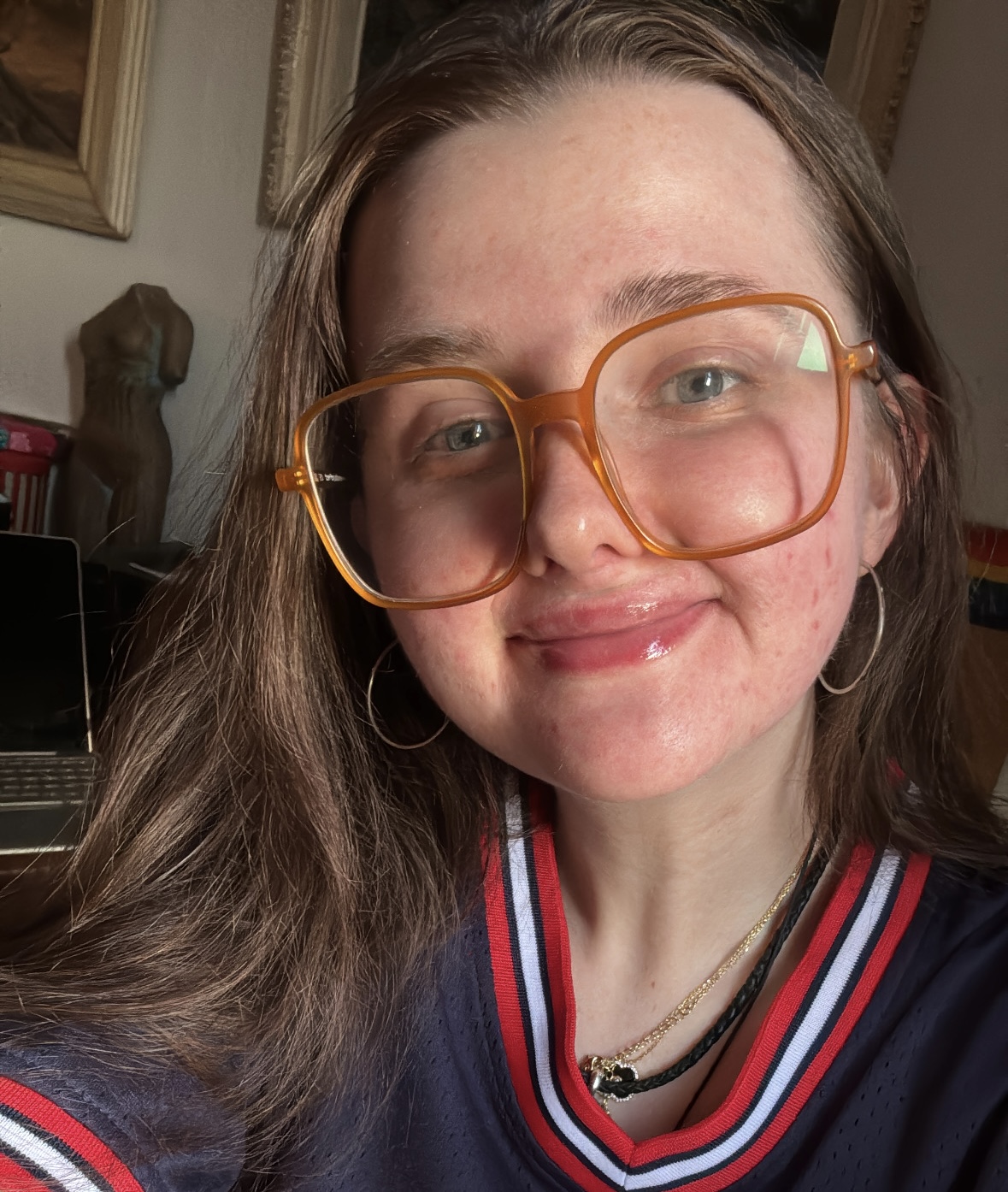 An image of a woman smiling.