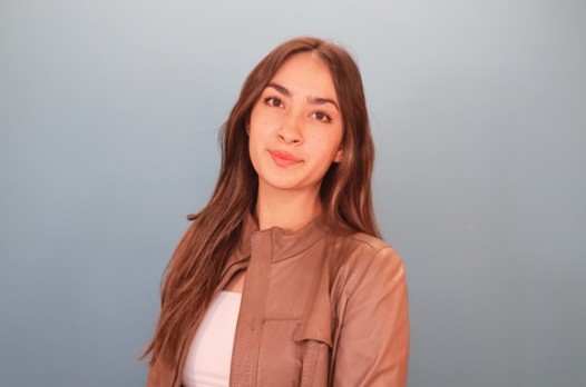 An image of a woman smiling.