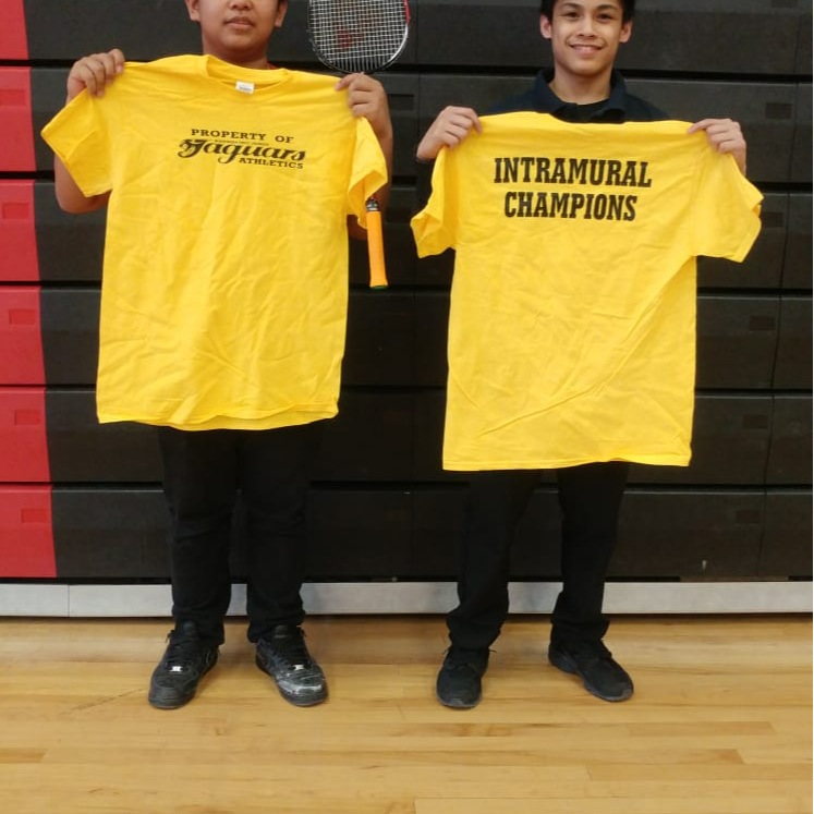 MPJ students holding up intramural champions shirt