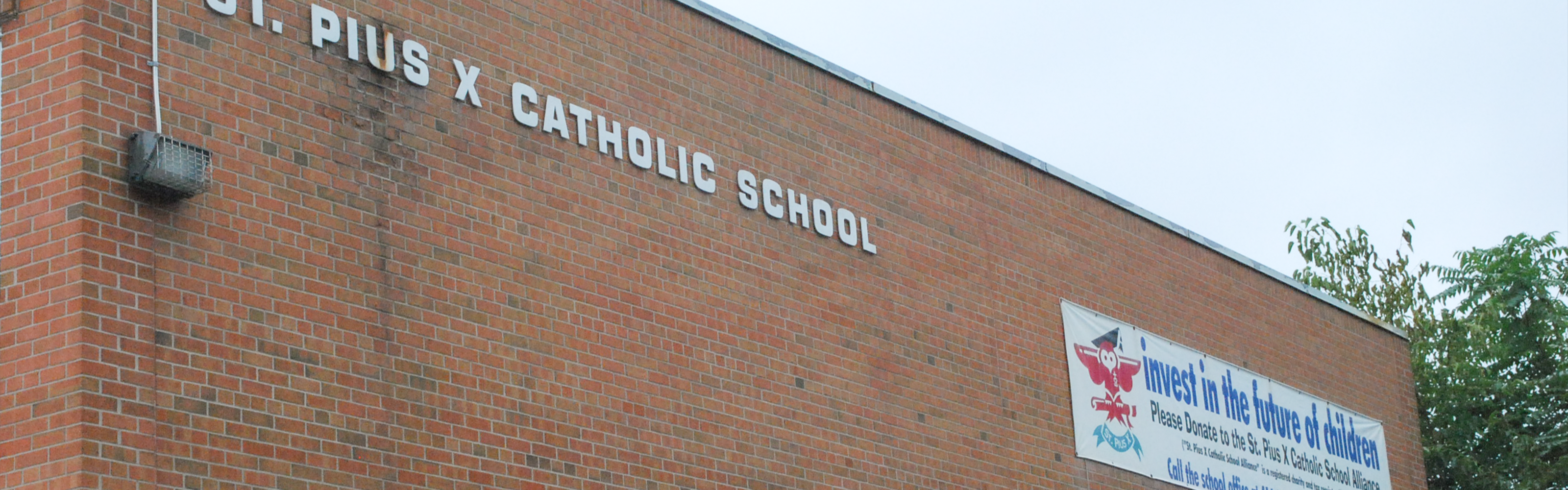 The front of the St. Pius X Catholic School building.