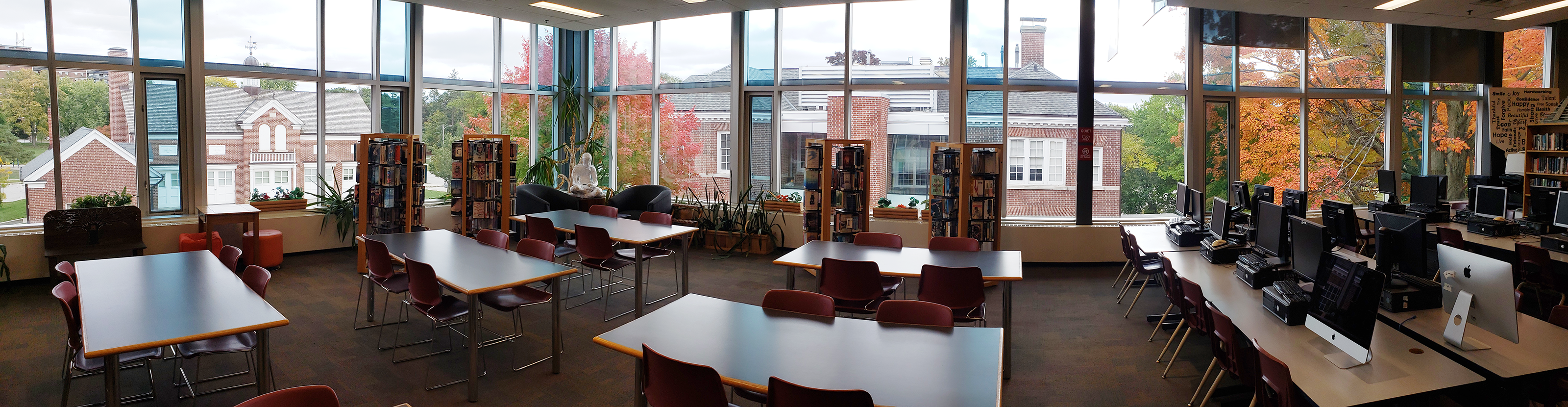 Photo of Senator O'Connor library with study areas, computer terminals, and bookshelves.